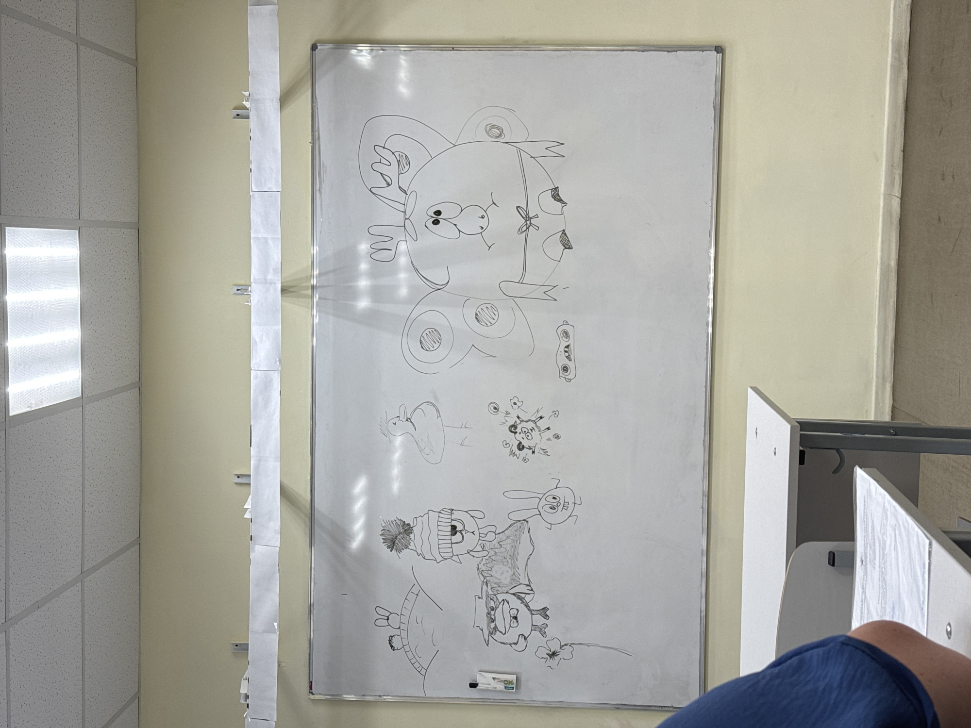 Whiteboard with drawings observed in Zav'yalovo classroom setting