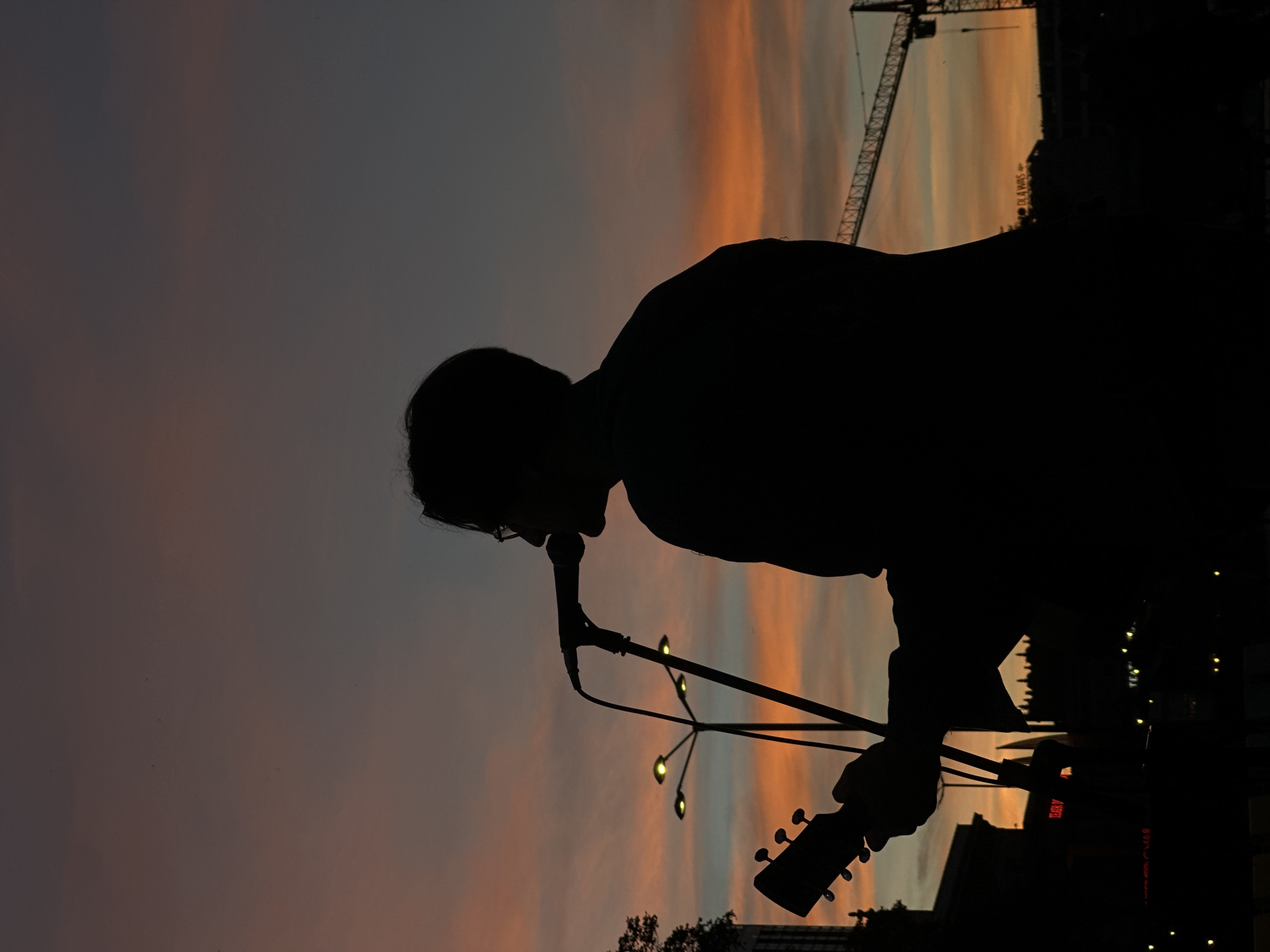 Live music and city skyline at golden hour in Warsaw