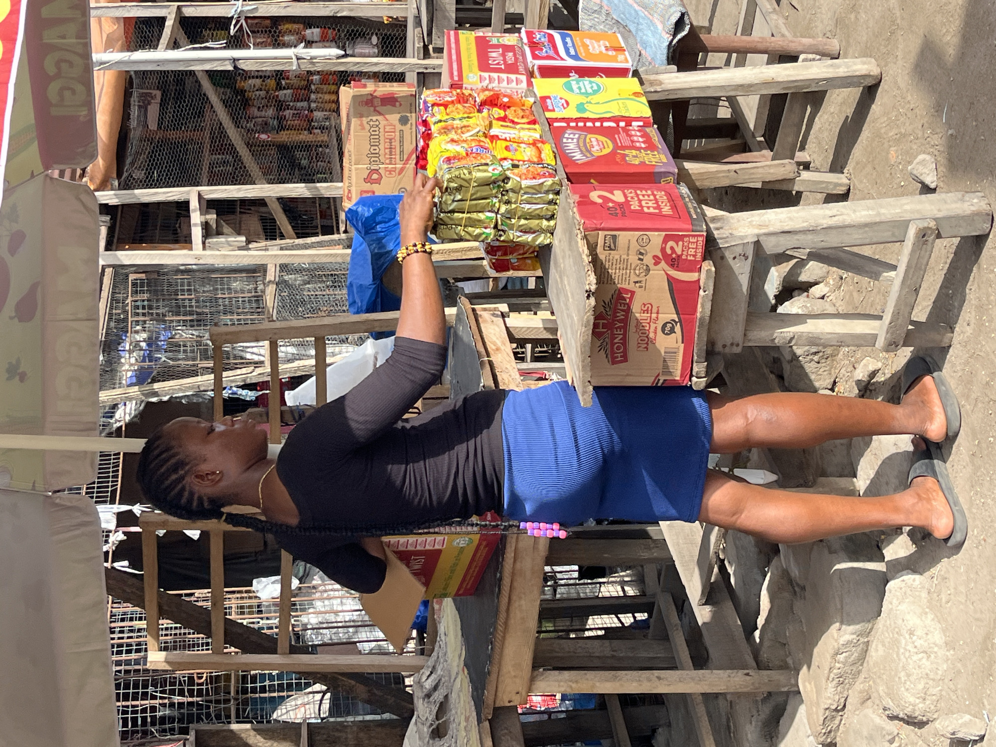 Street vendors conduct morning business at Badagry markets
