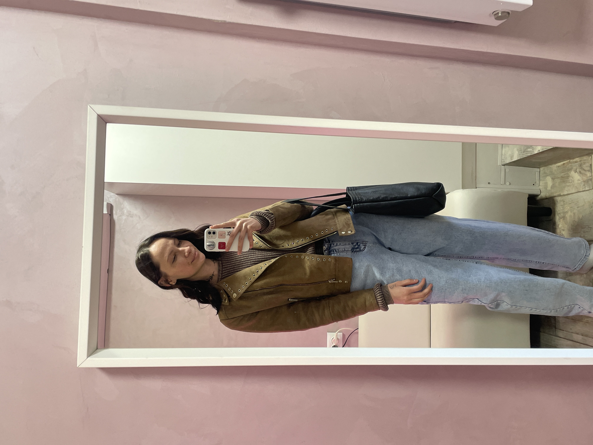 Woman takes mirror selfie in Izhevsk