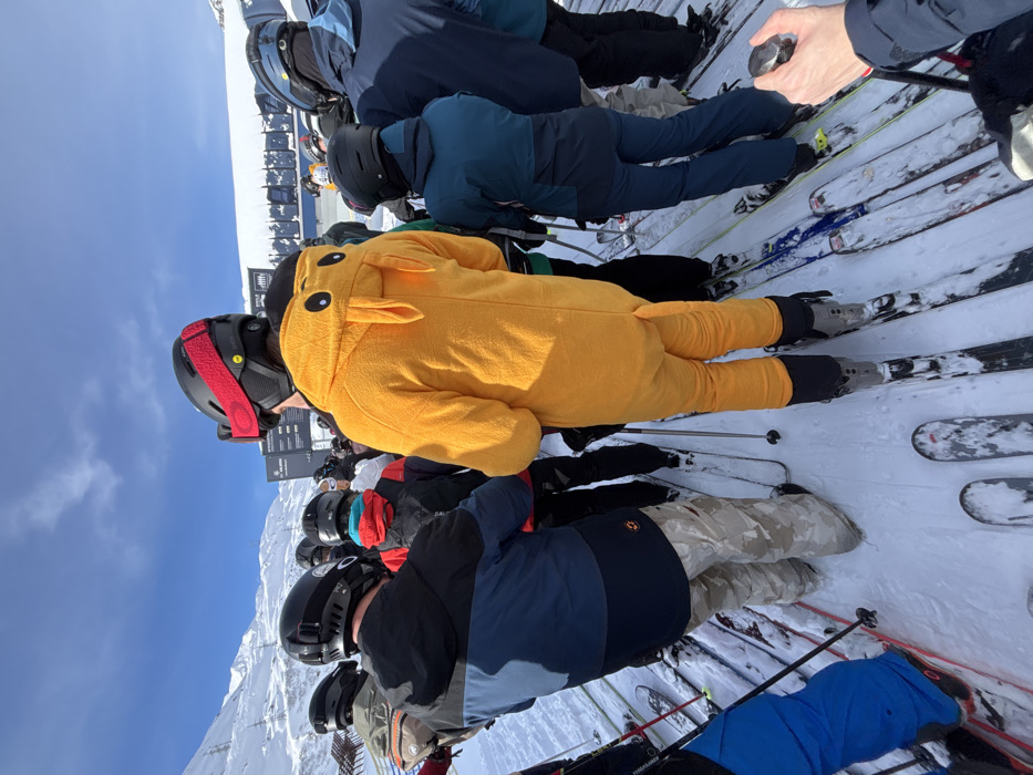 Skiers queue at Austrian resort under clear skies