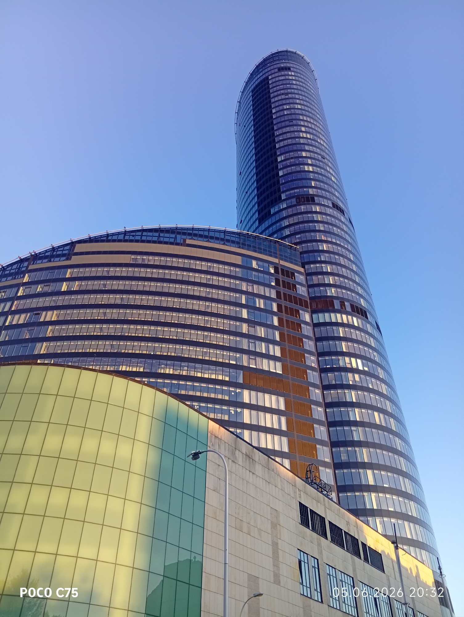 Evening architectural documentation of Wrocław's Sky Tower complex