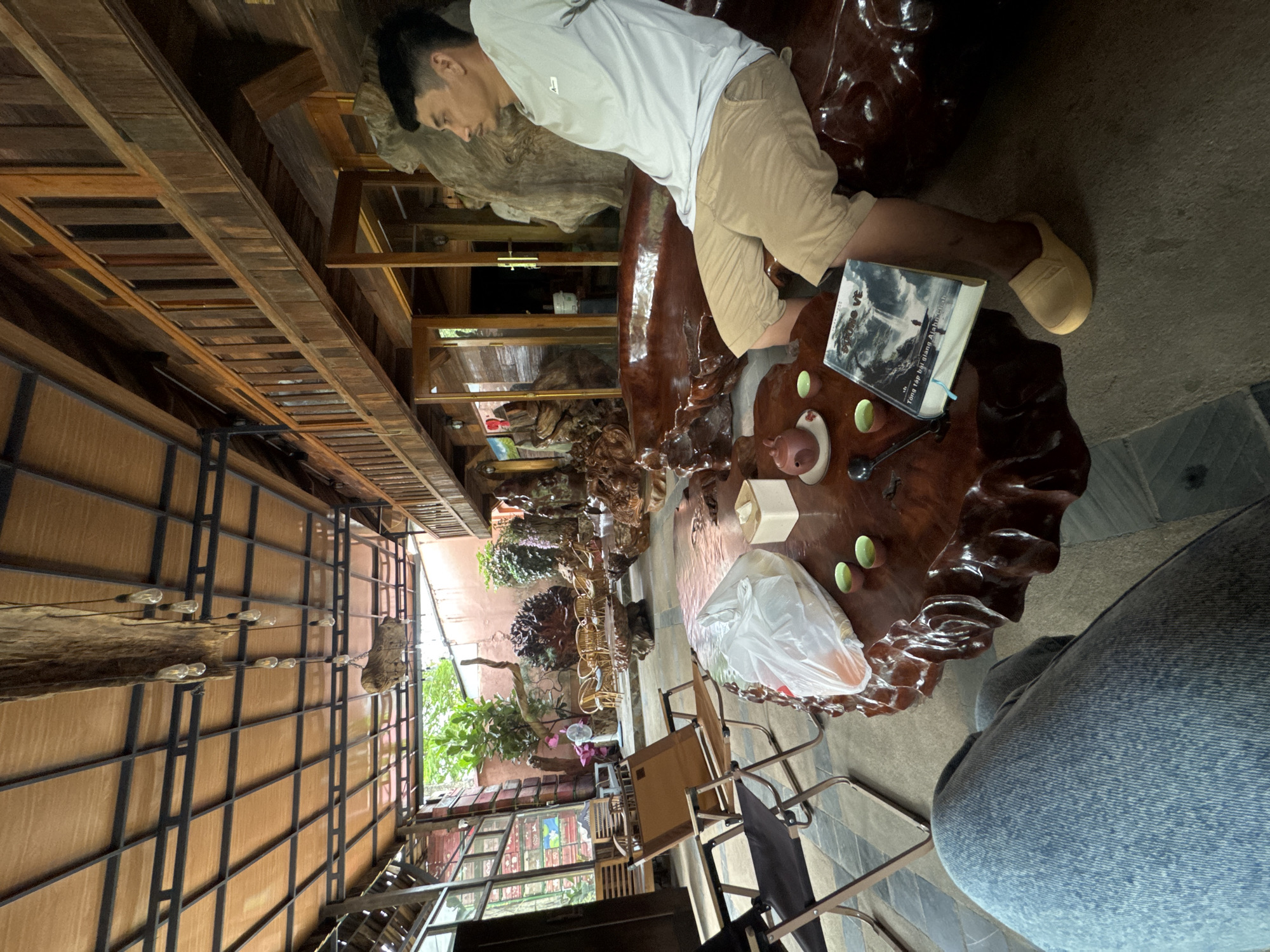 Morning leisure moments captured at Vietnamese outdoor dining area