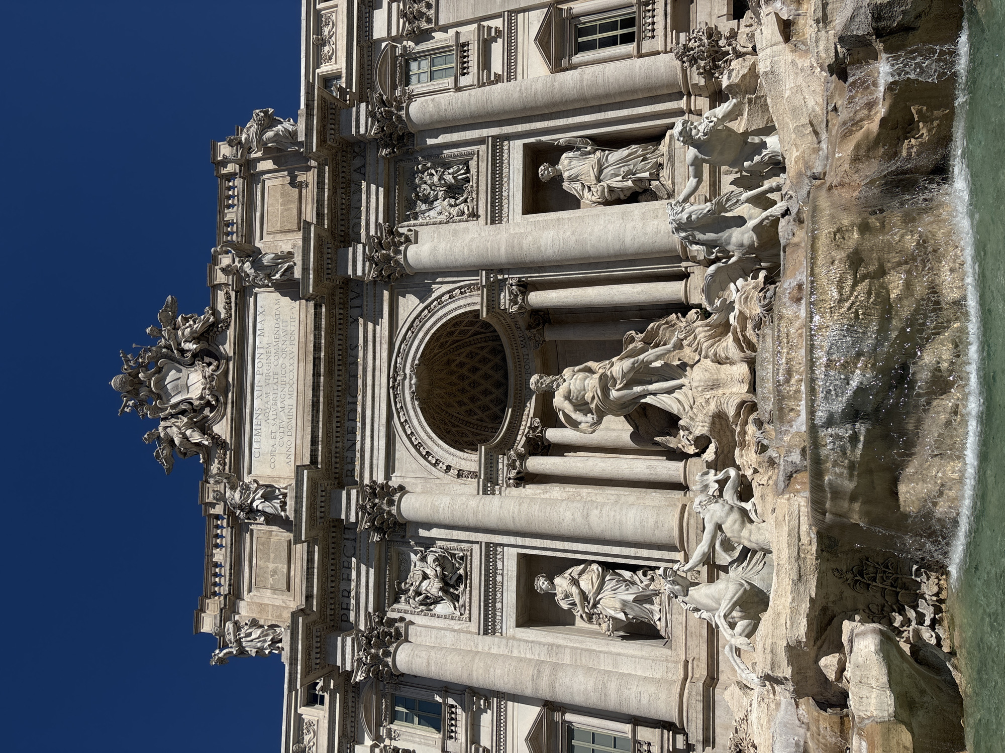 Morning scenes captured around Rome's iconic Trevi Fountain