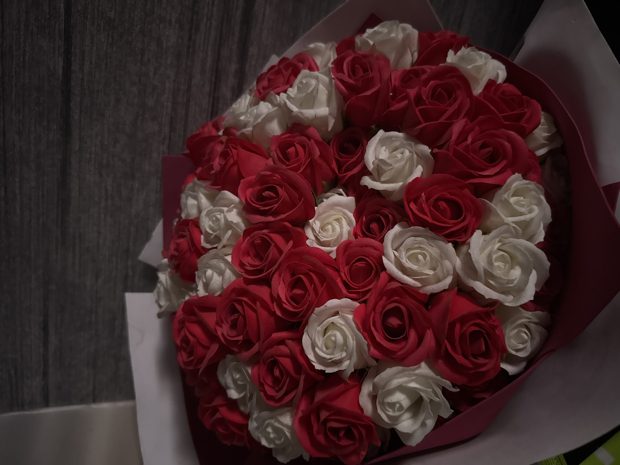 Beauty products and floral arrangements documented in evening session