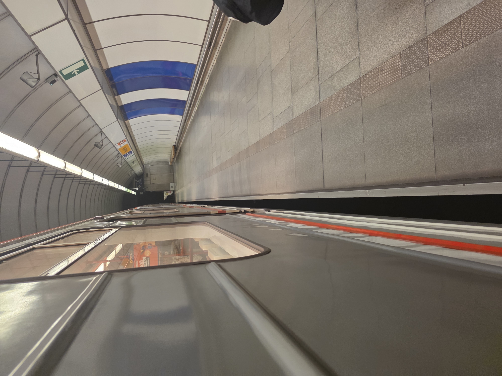 Mixed urban memories: subway station, abstract art, piano display