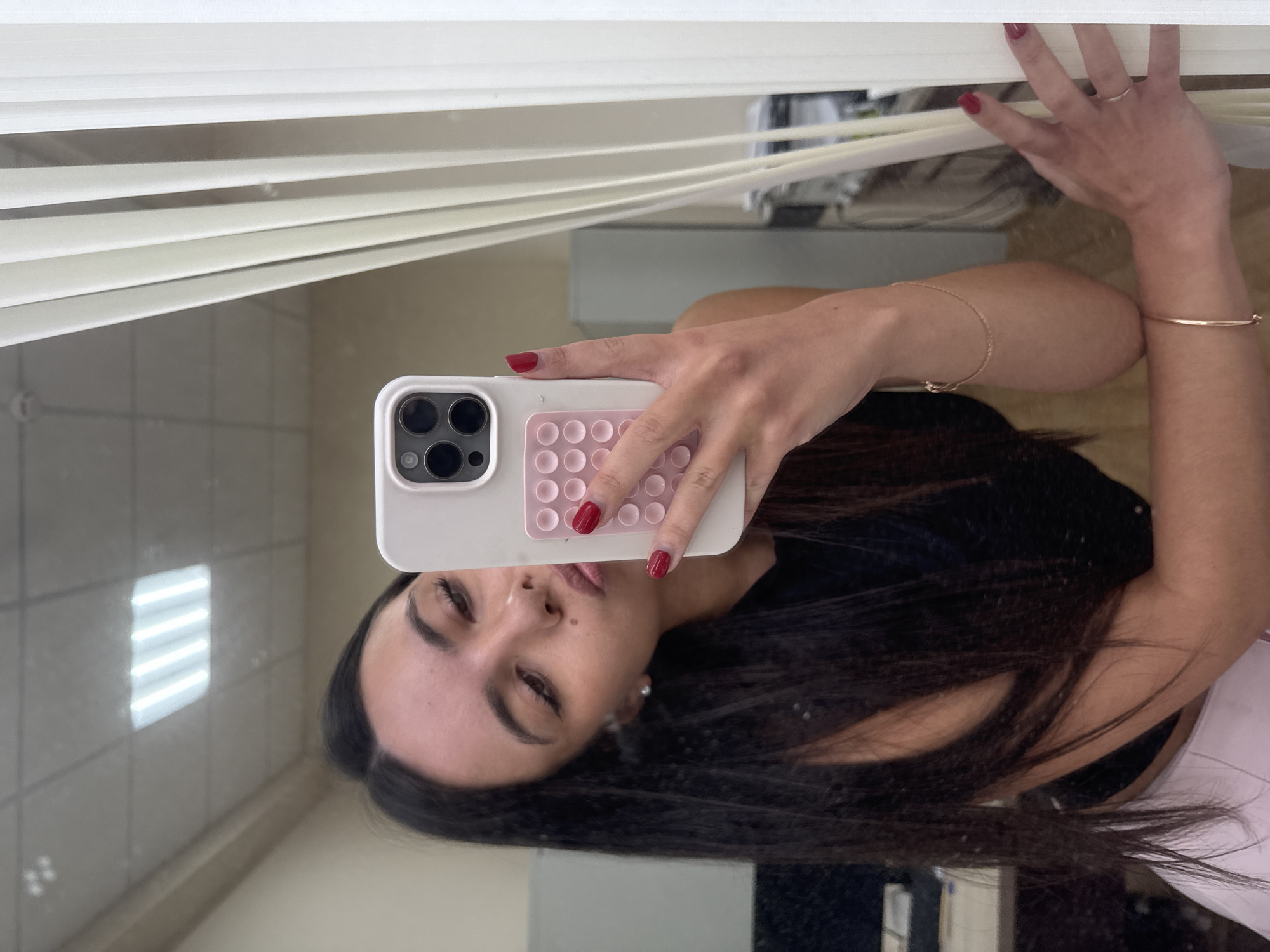 Mirror selfie, food container, and a duckling plate