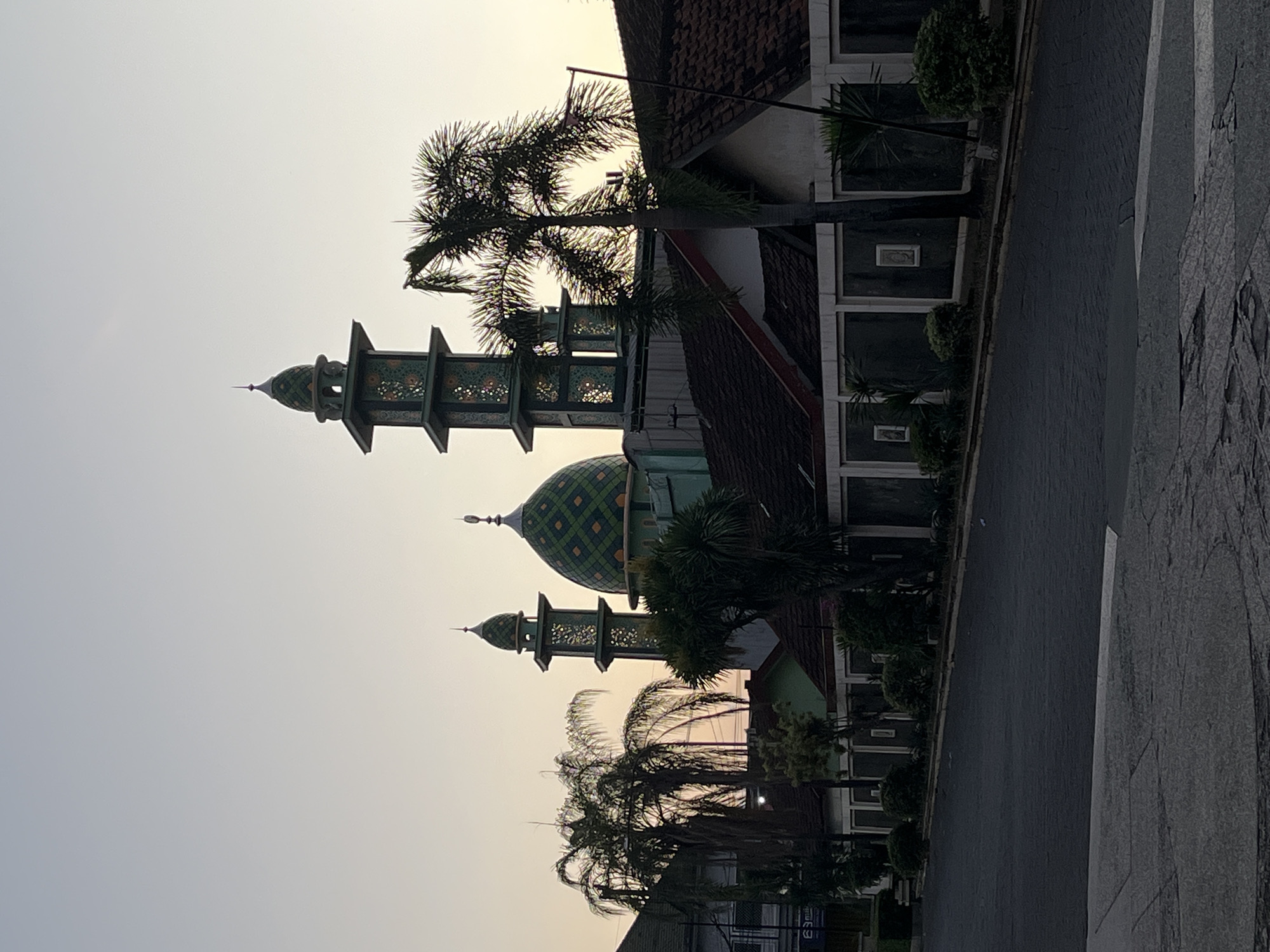 Dusk settles over everyday street life in rural East Java