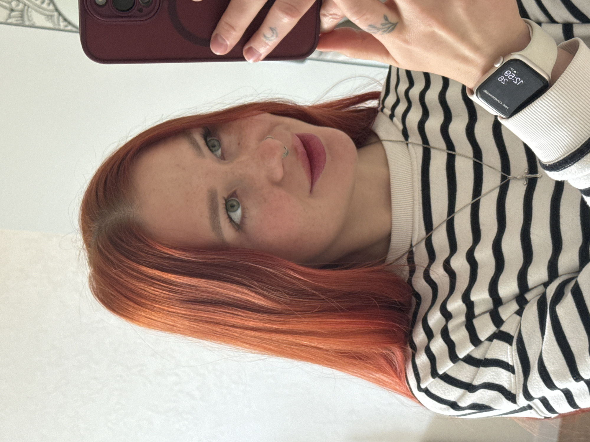 Woman documents morning routine with selfies, cat, cookie in Rostov-on-Don