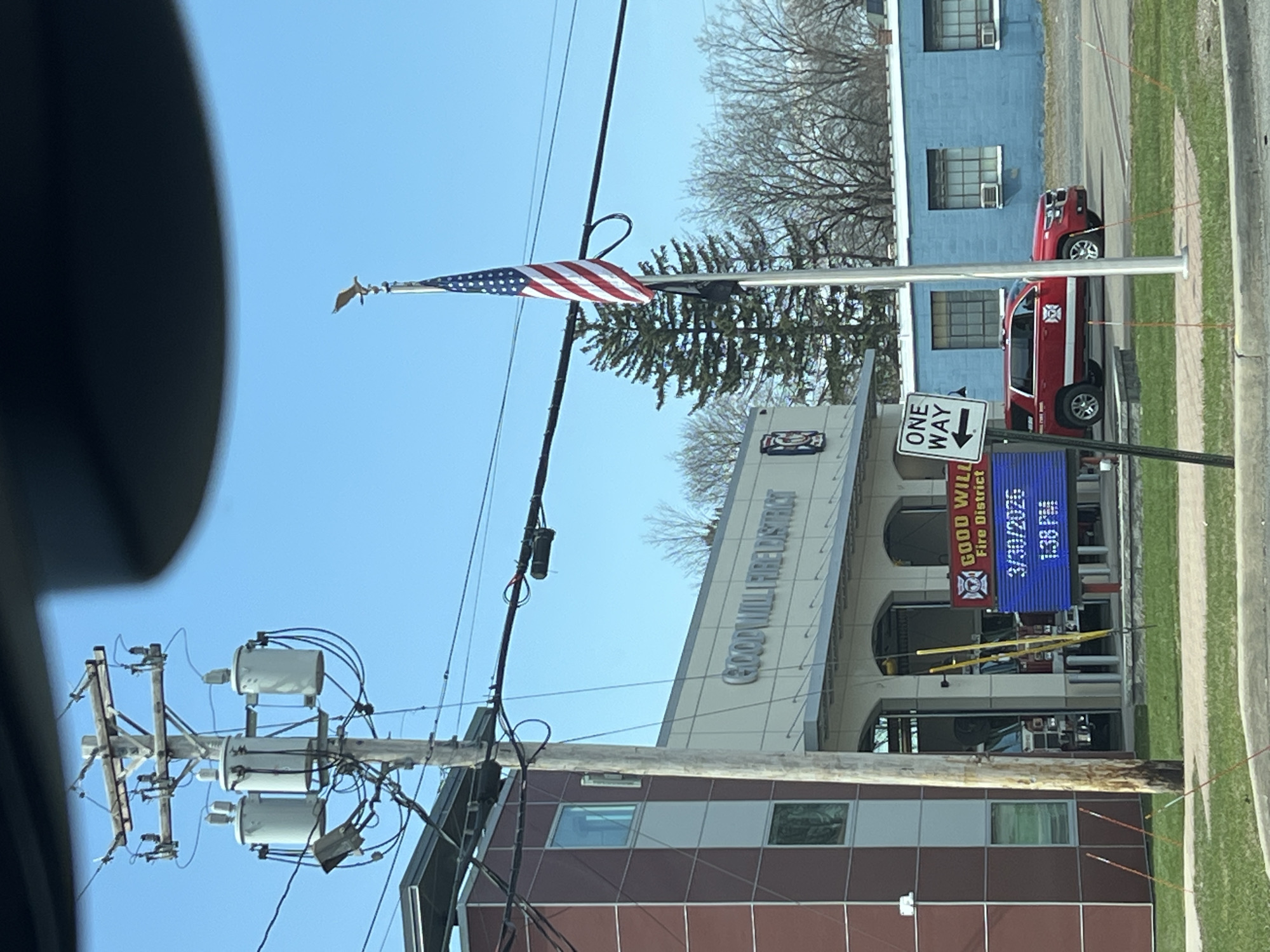 Fire station documented in Newburgh with flag display