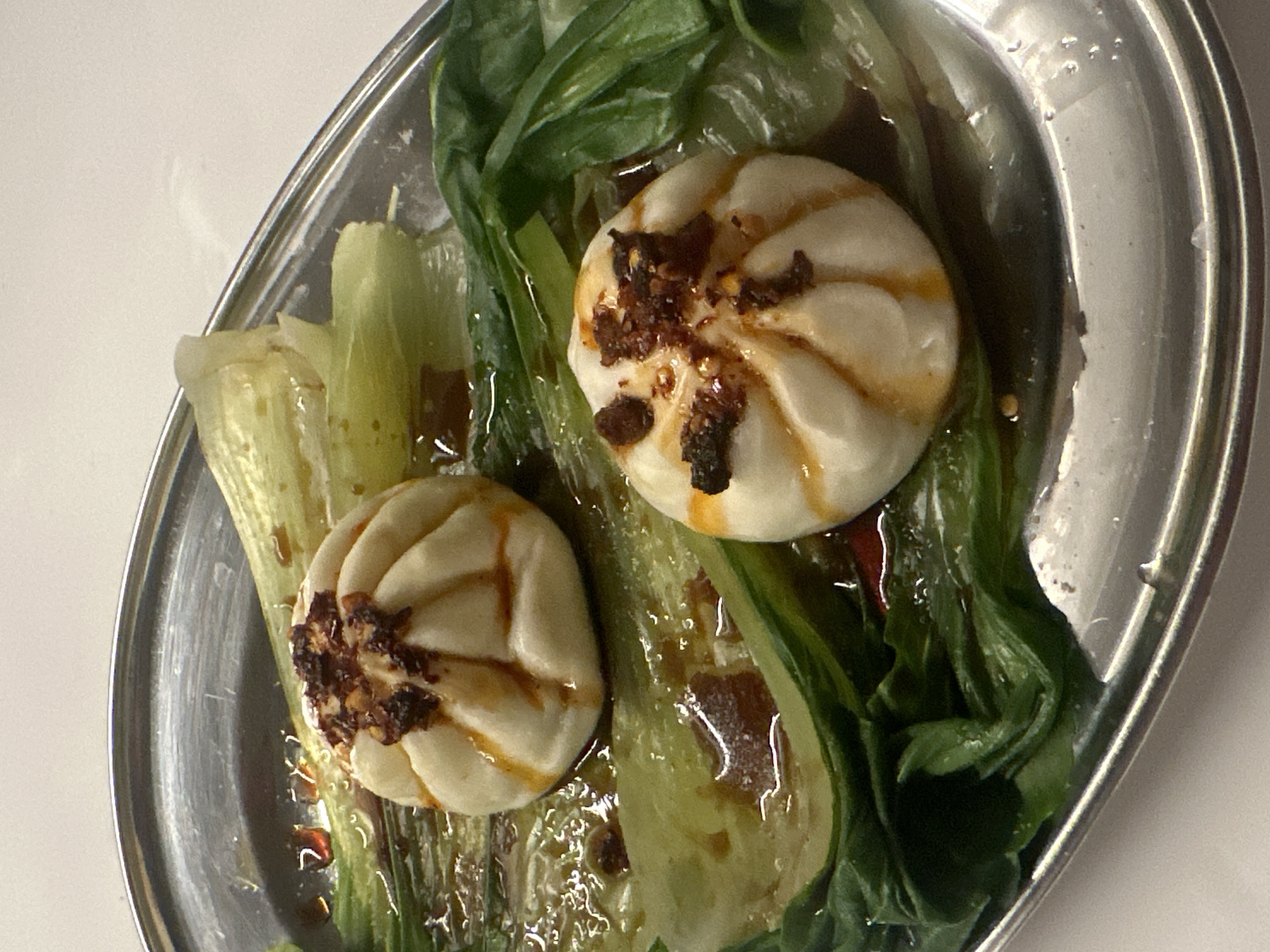 Steamed buns with chili crisp photographed in London