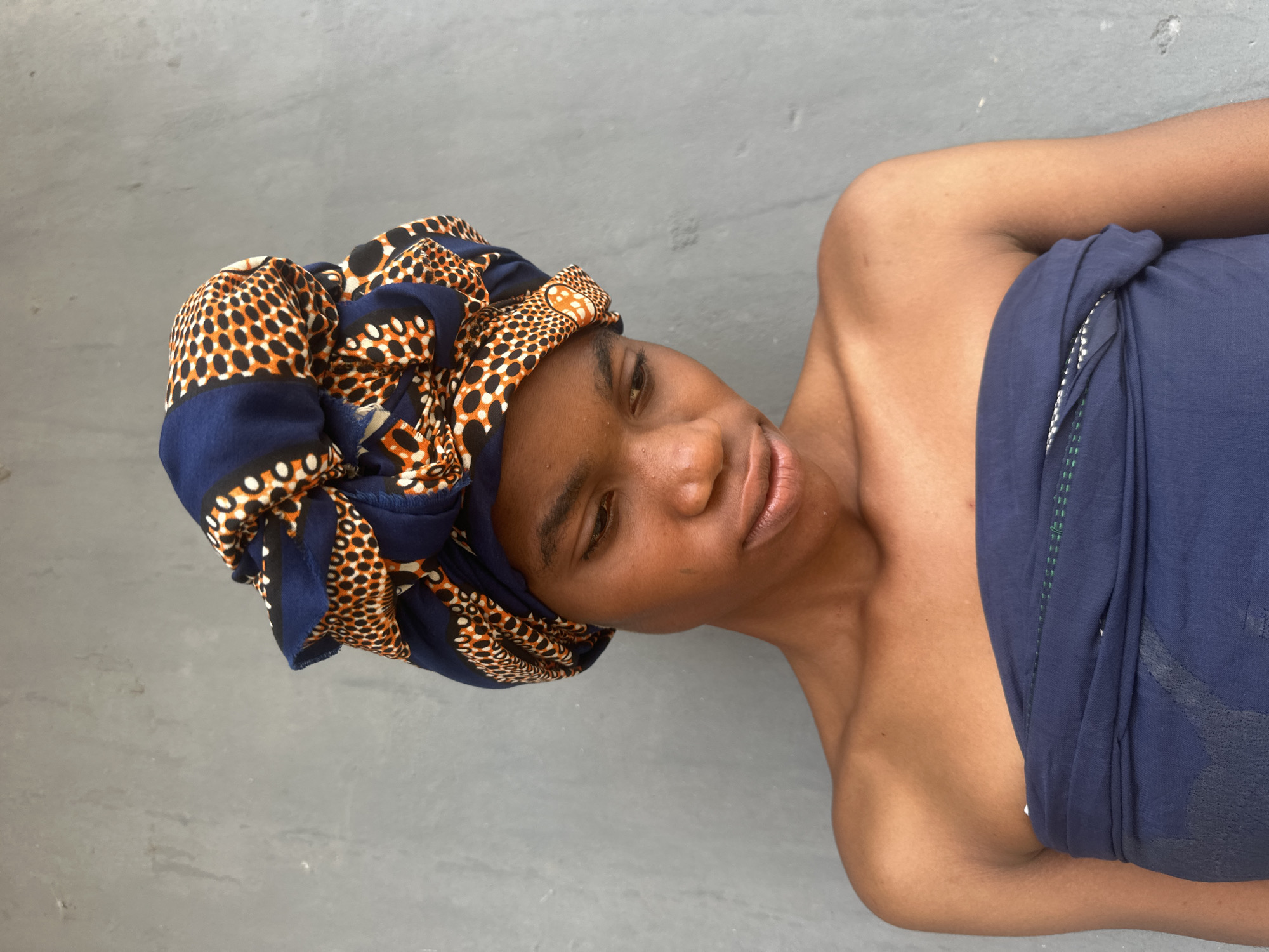 Portrait session in Badagry, Nigeria, featuring a patterned headwrap look.