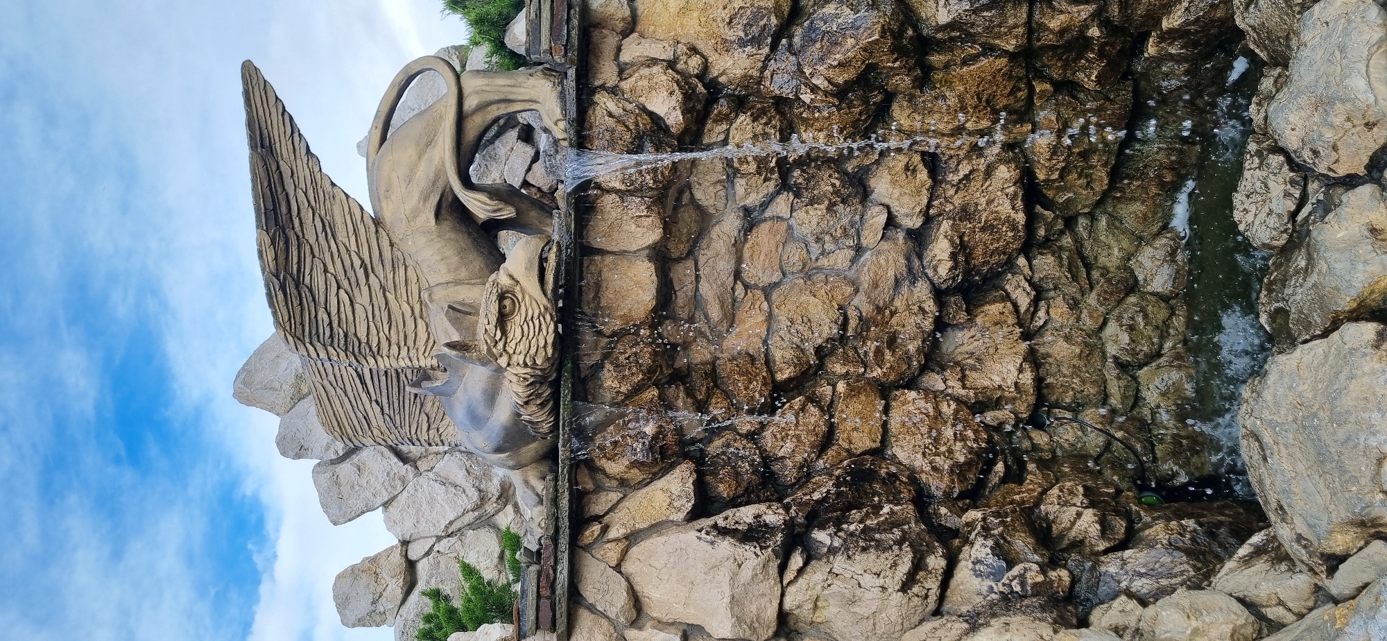 Griffin fountain and dogs observed in Feodosia, Ukraine