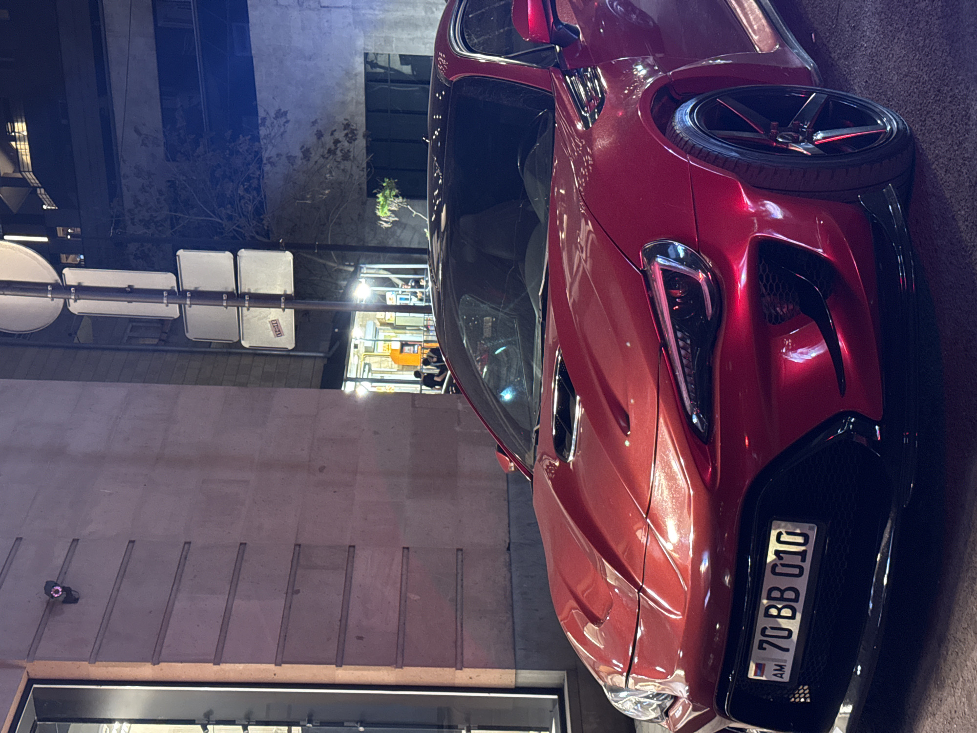Red sports car spotted near construction zone in Yerevan