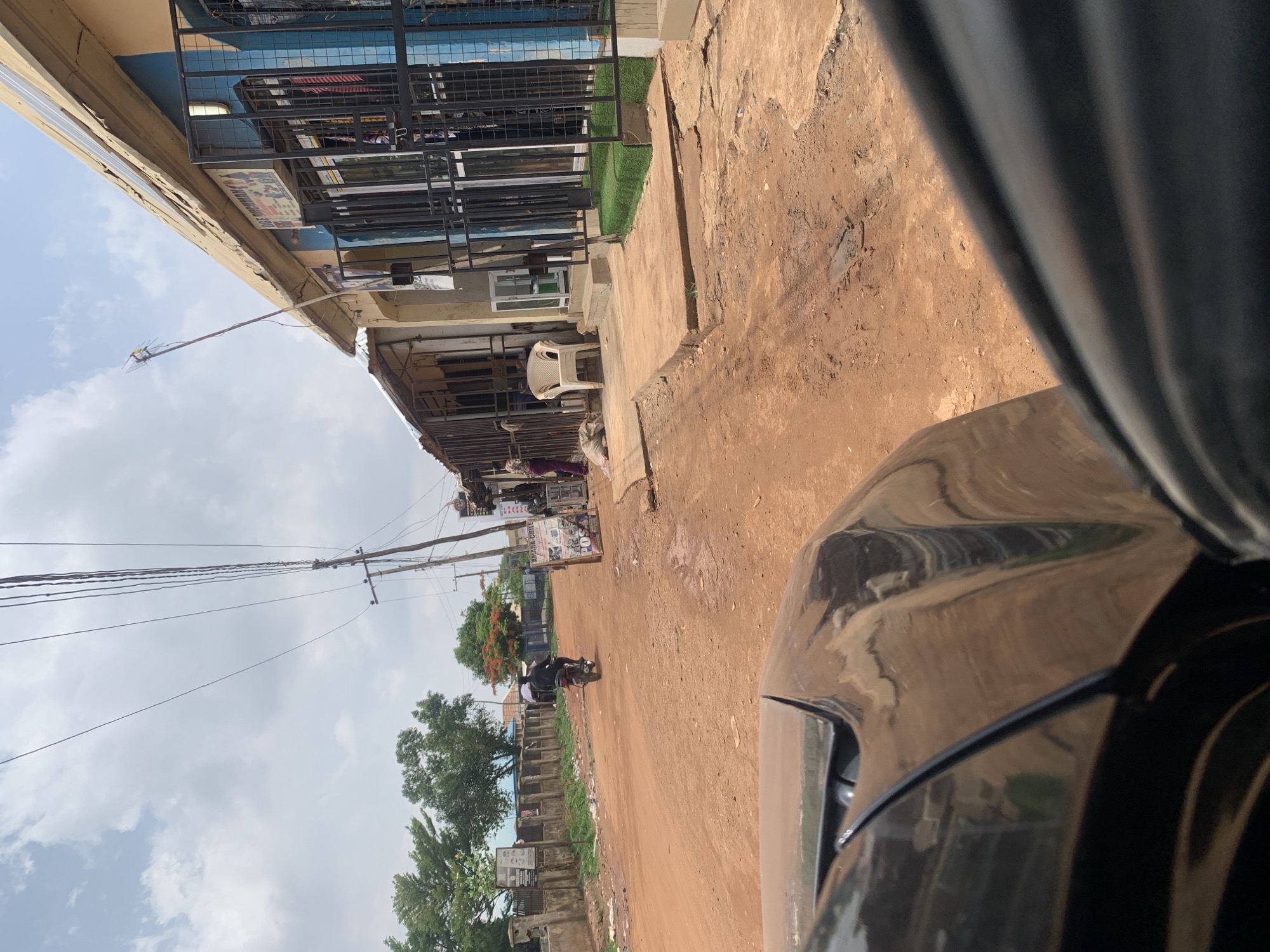 Daily street life documented in Madalla, Nigeria commercial district