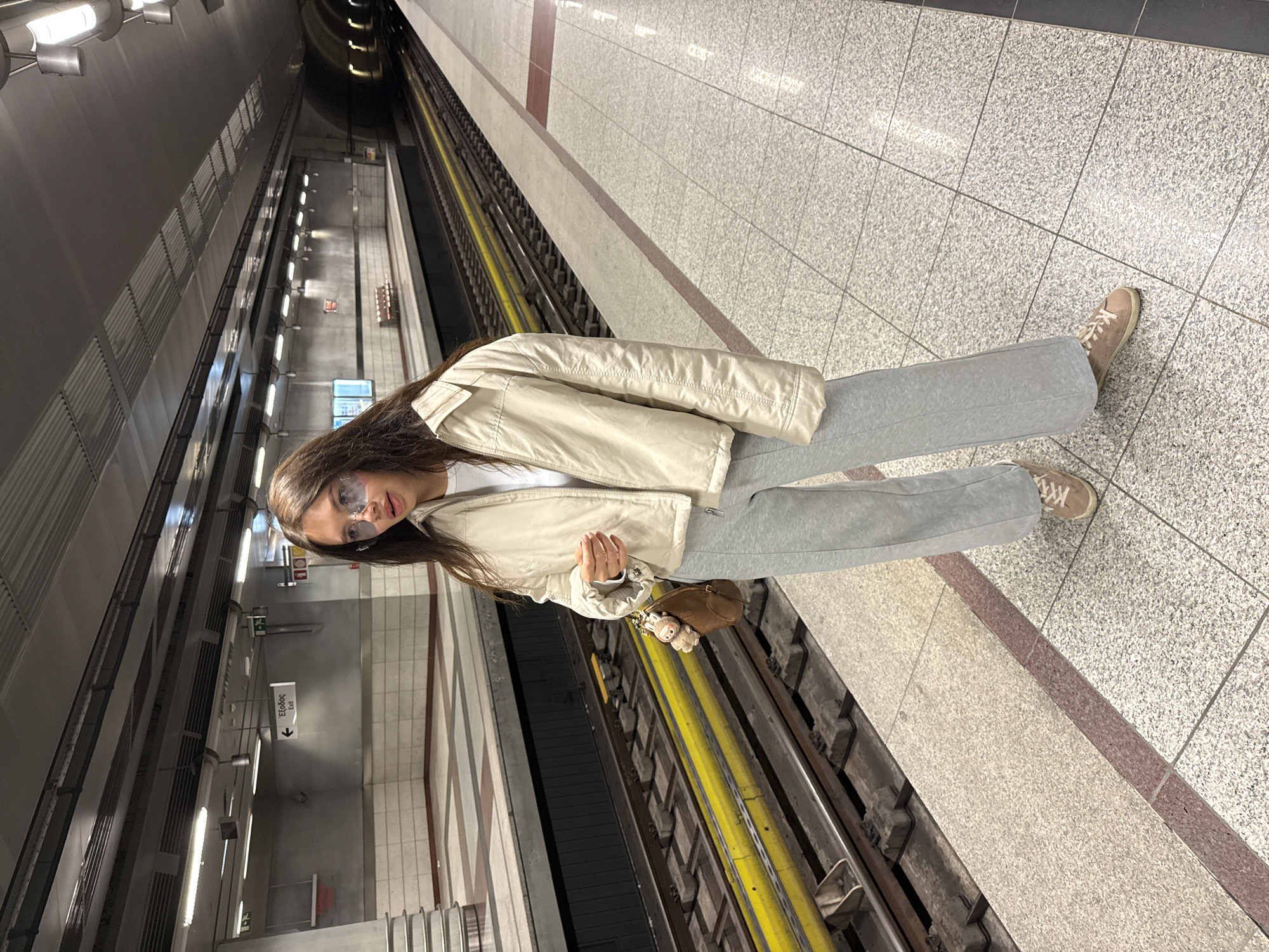 Person in casual attire observed at Greek metro station