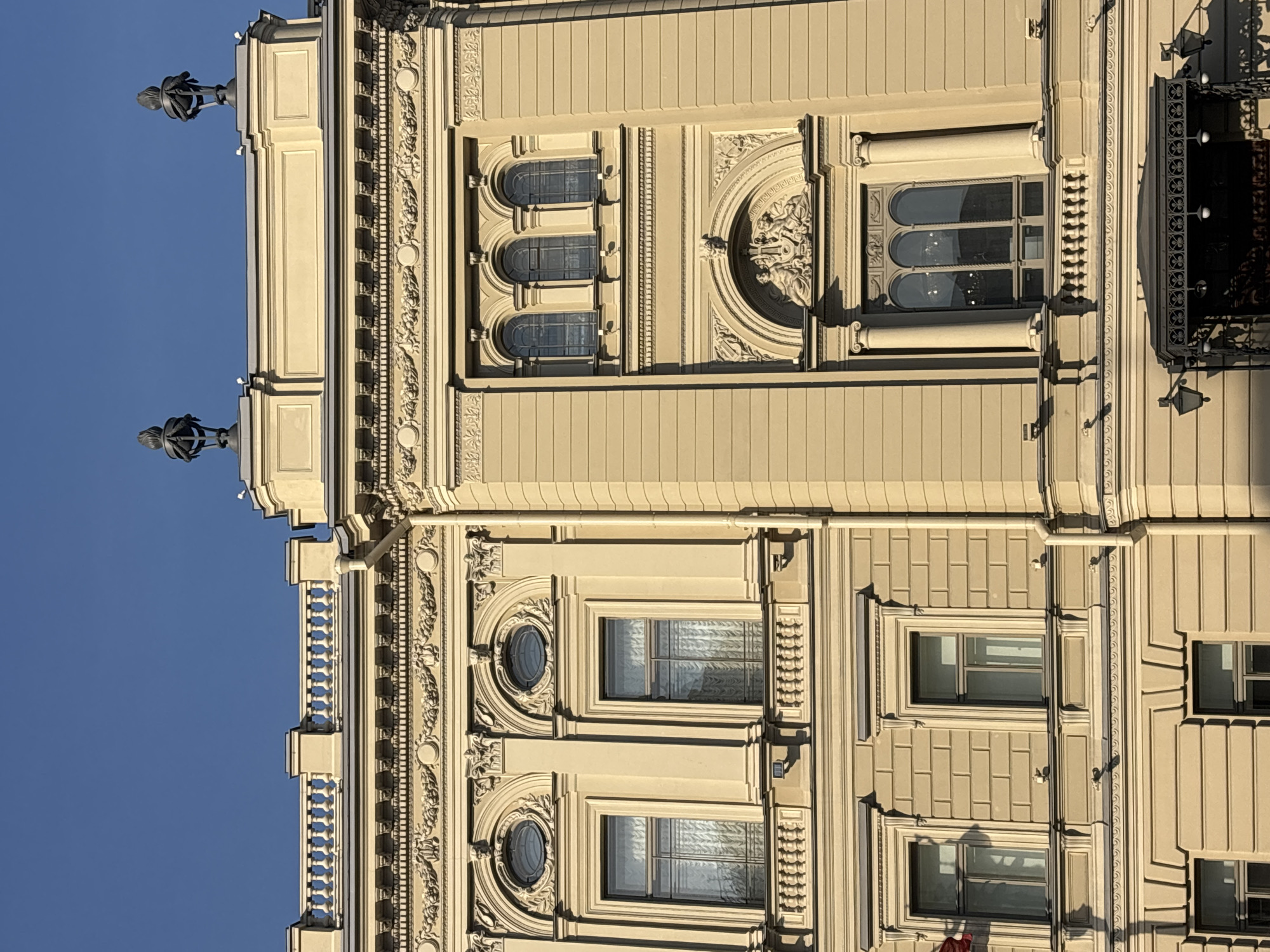 Tourist documents Saint Petersburg architecture and cafe during afternoon stroll