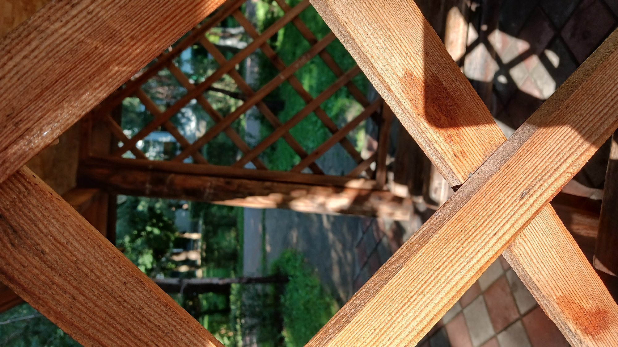 Afternoon at a park with playgrounds, sculptures, and nearby construction