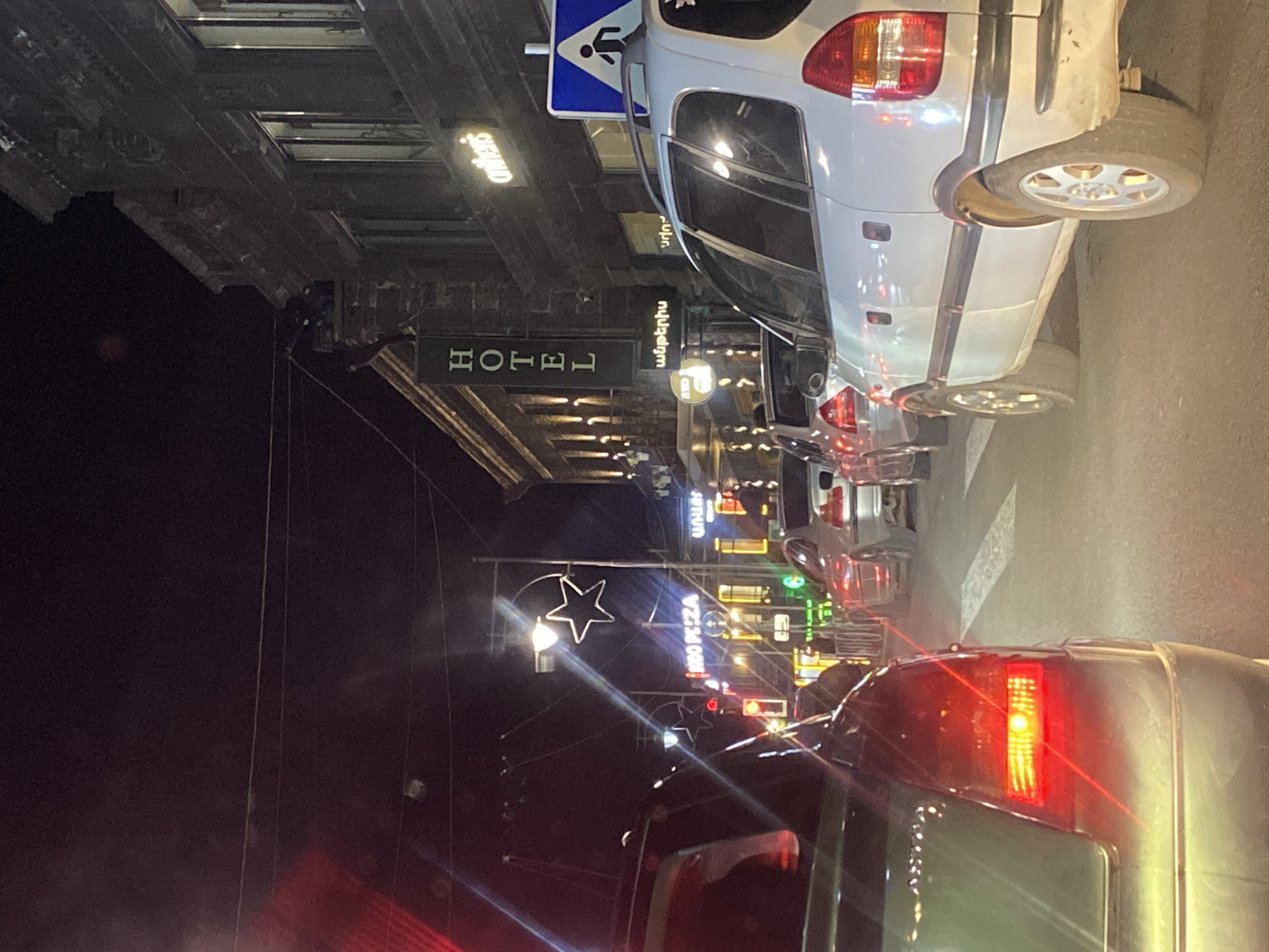 Gyumri streets at dusk: traffic, fountains, and nightlife