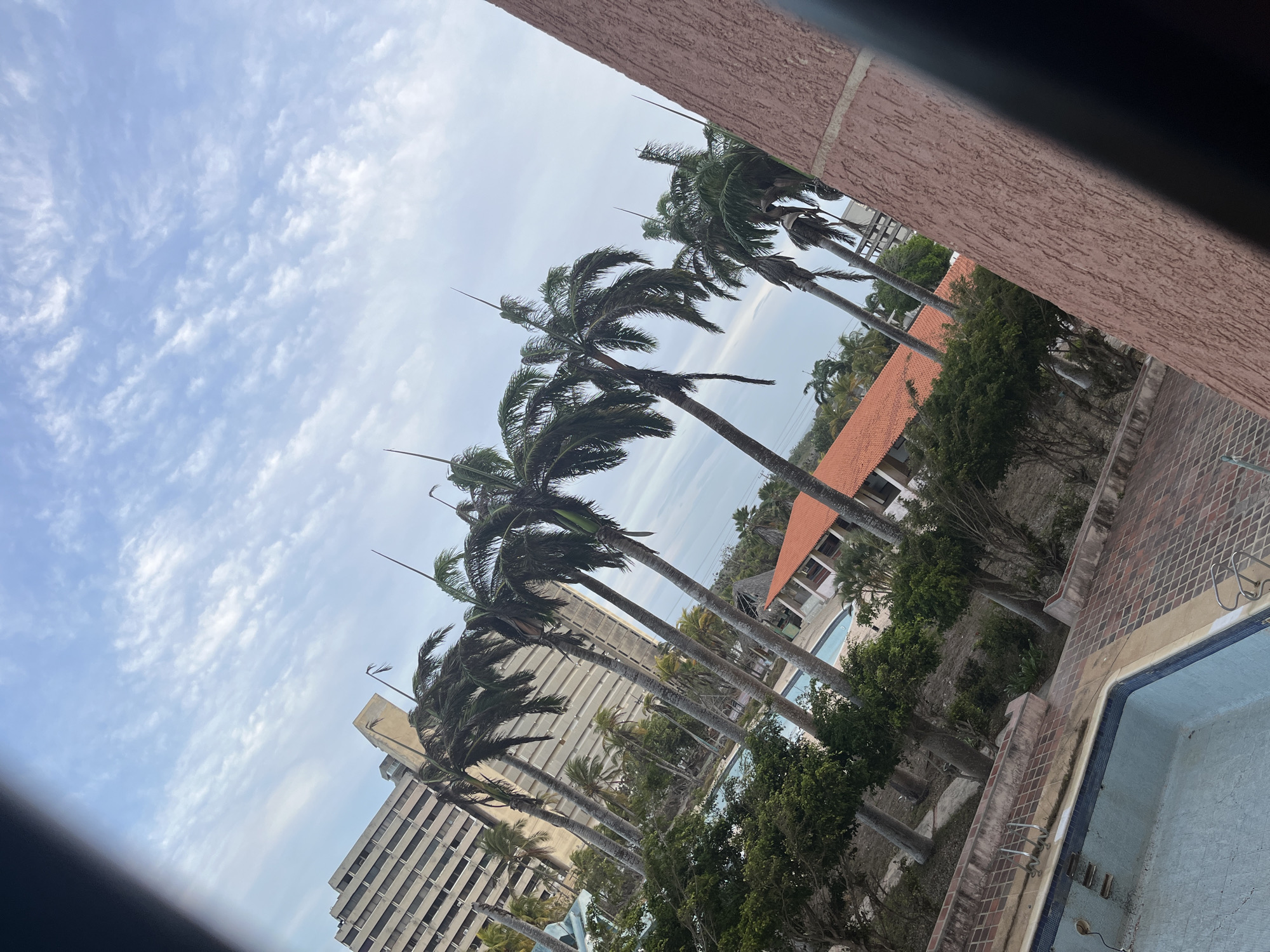 Resort stay documented in Porlamar, Venezuela with pool views