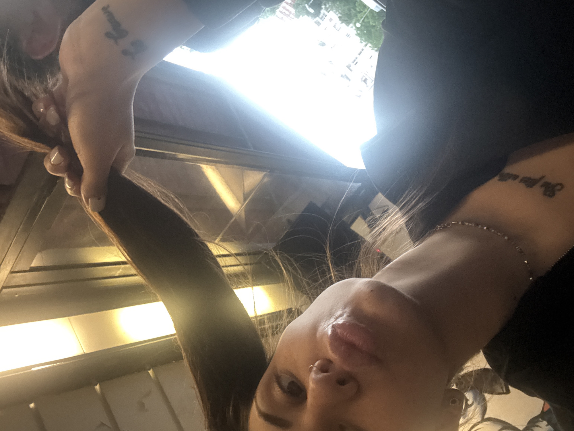 Woman takes selfie on public transport in Sofia