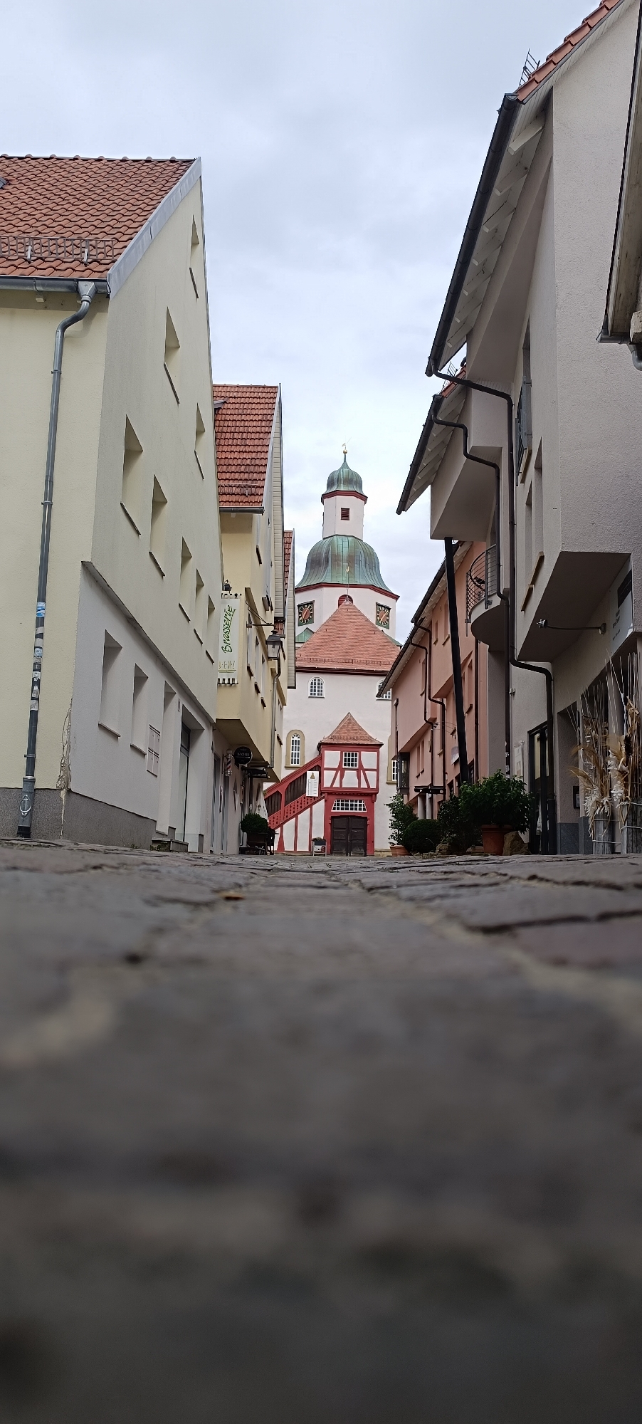 Winnenden's green-domed church tower at dusk, every angle