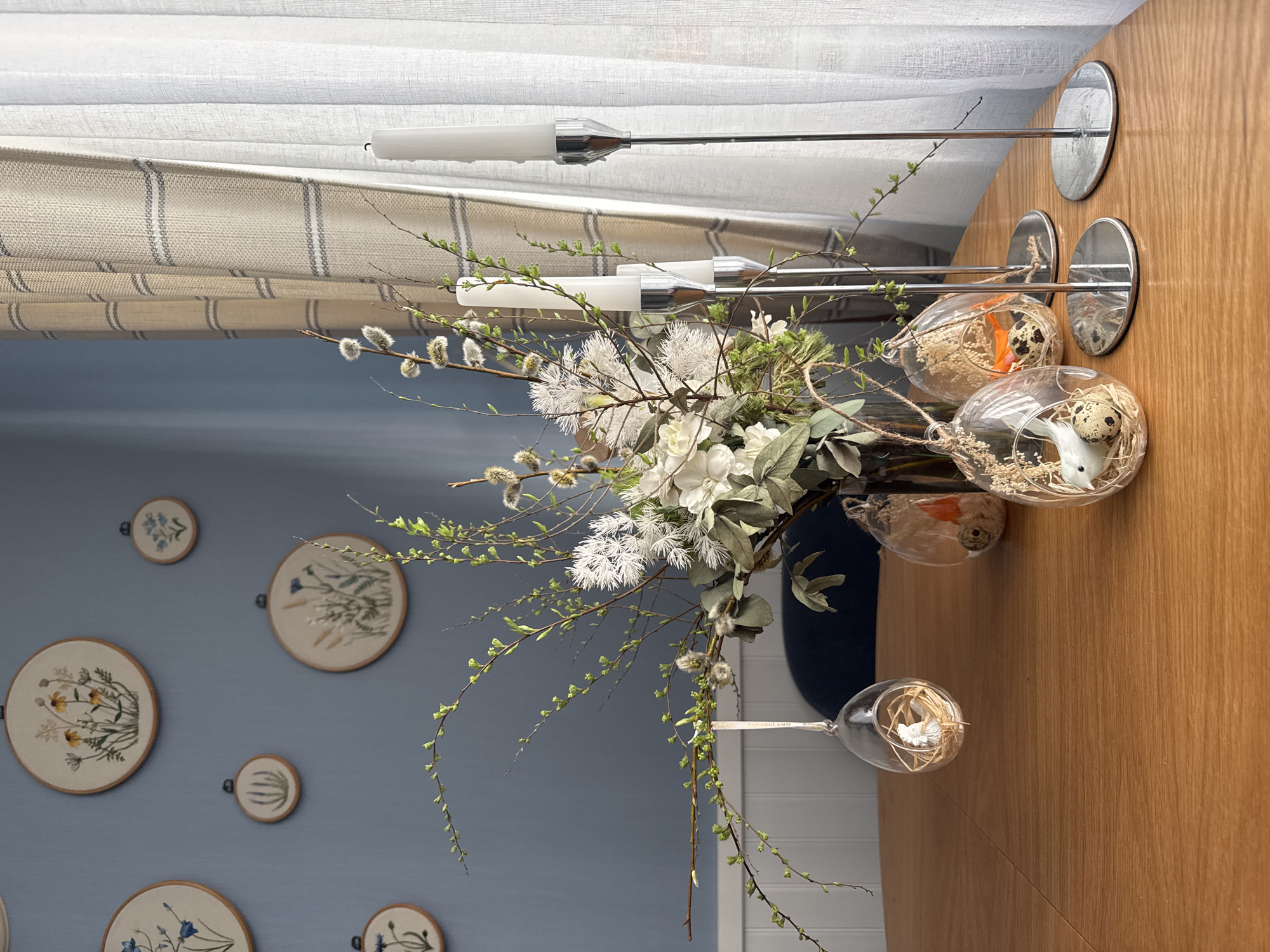 Still life arrangement with suspended glass orbs observed in Saint Petersburg
