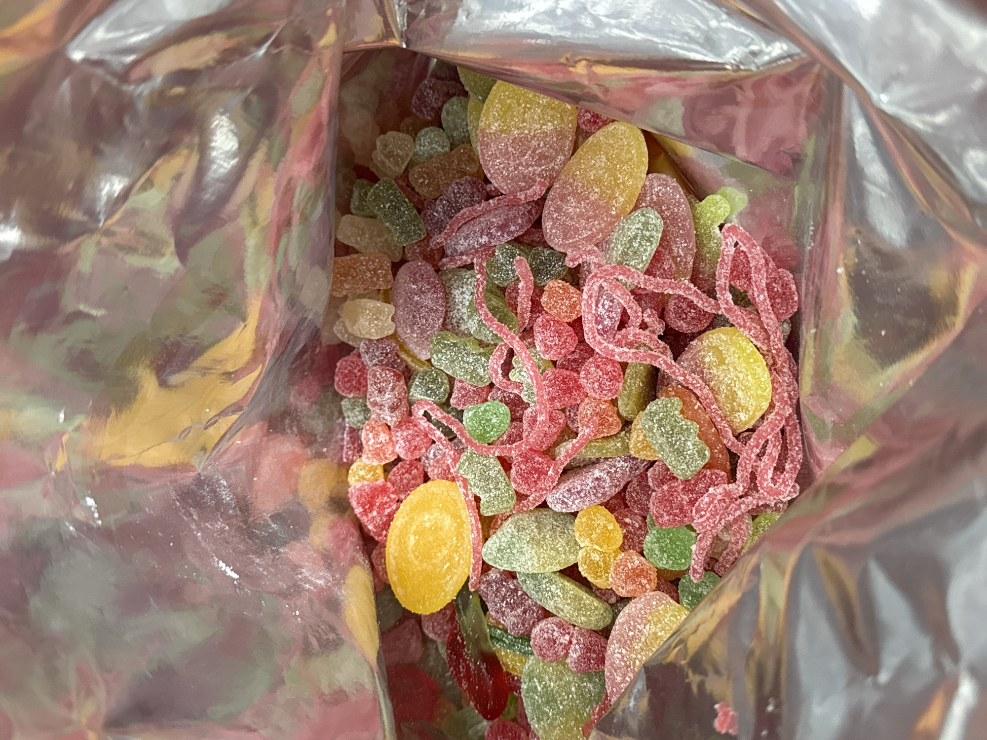 Multicolored gummy candies observed in silver package, Zhiten Bulgaria
