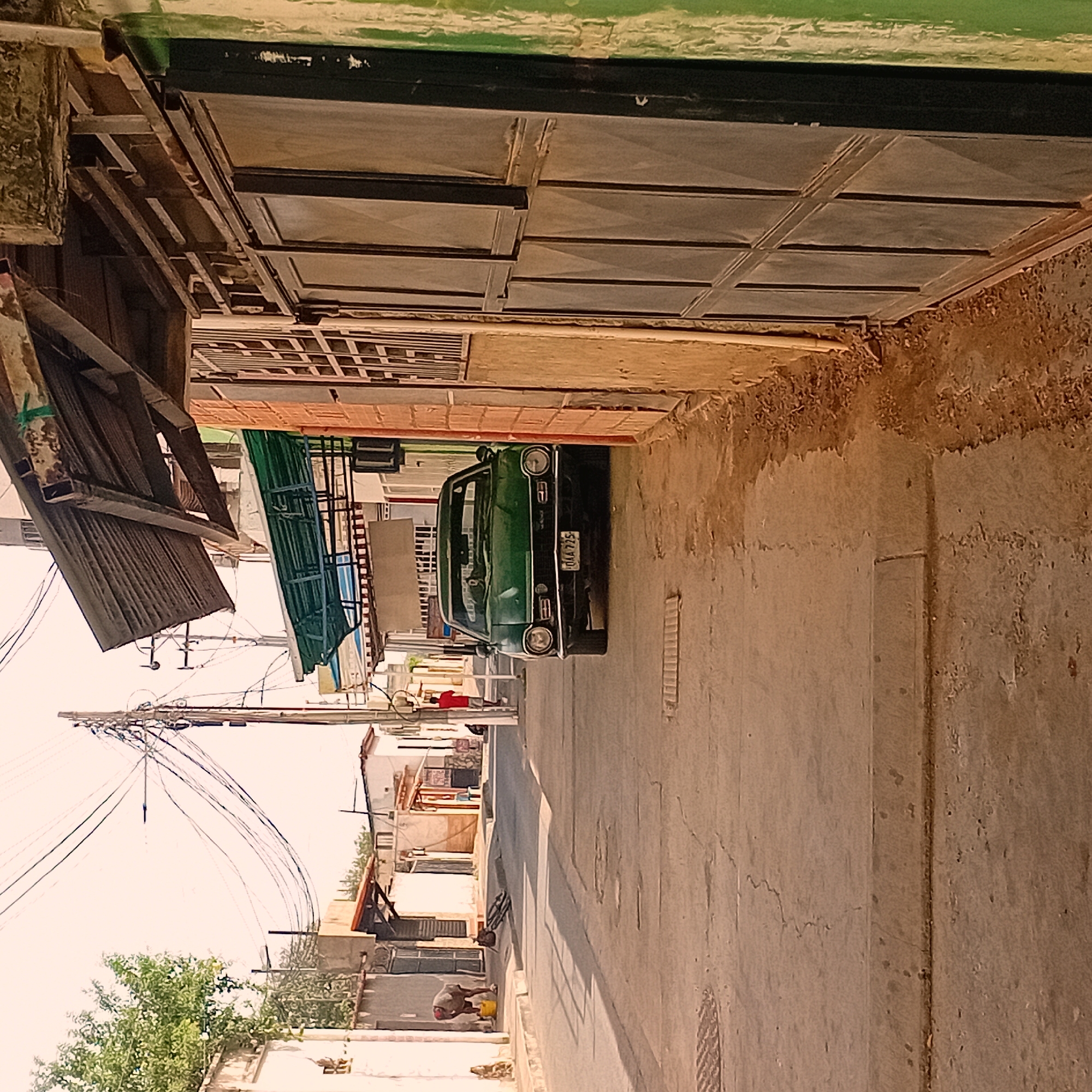 Urban street scenes documented during midday work activity