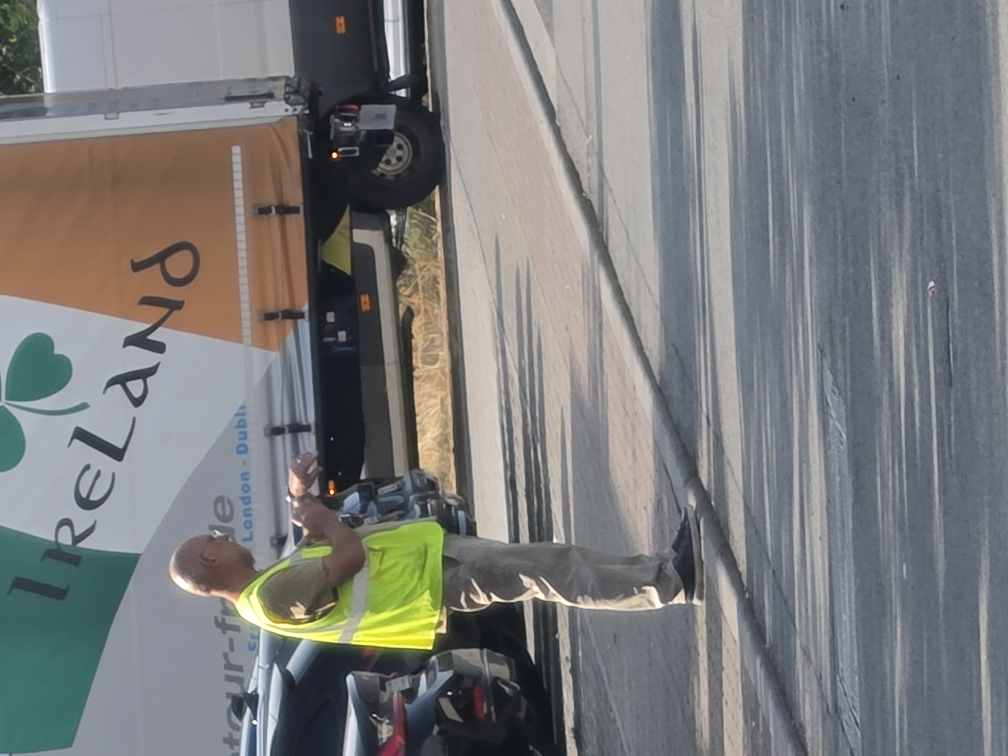 Logistics crew at work in a Frankfurt vehicle lot