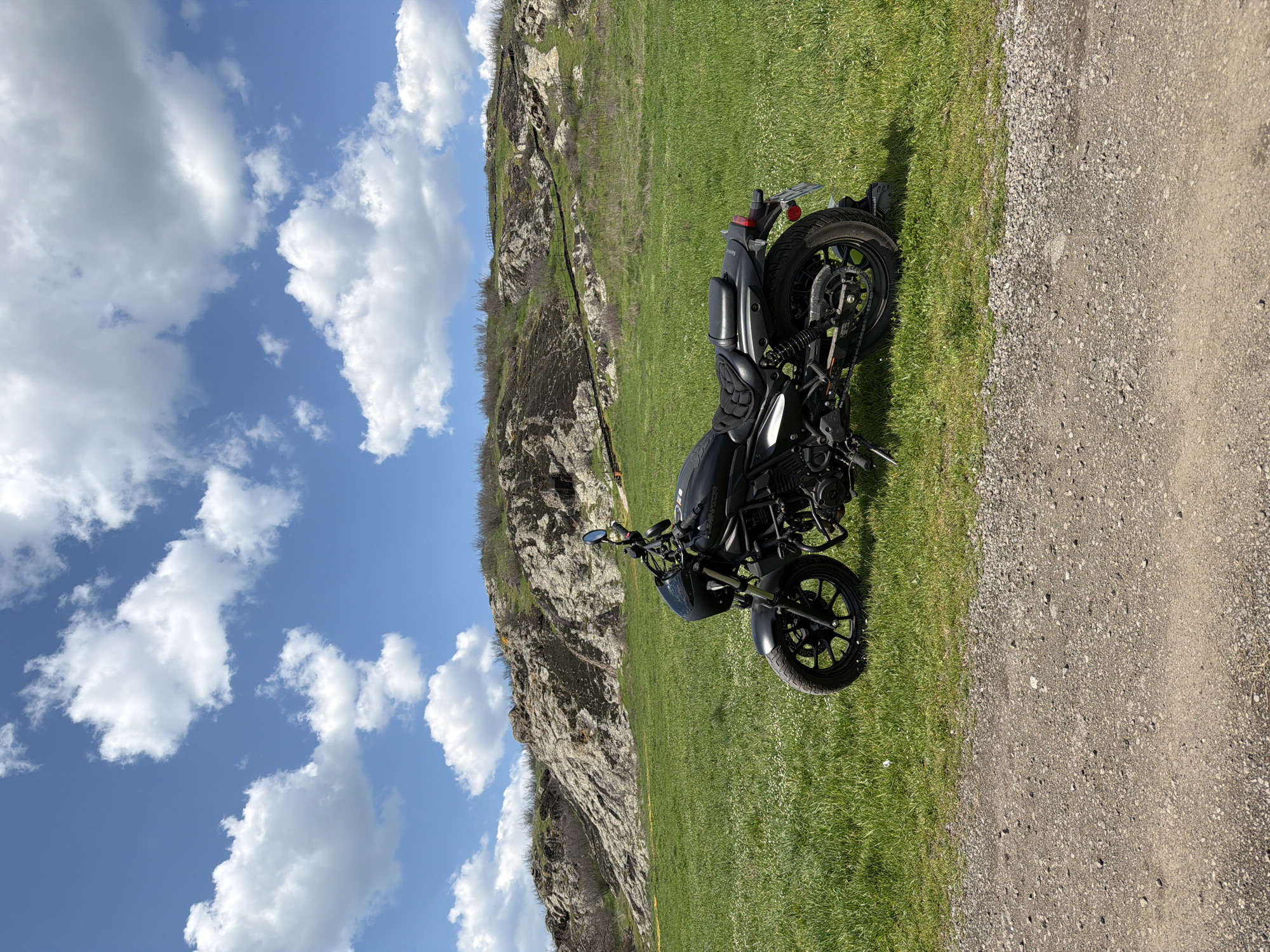 Motorcycle and hillside landscape documented in rural Bulgaria