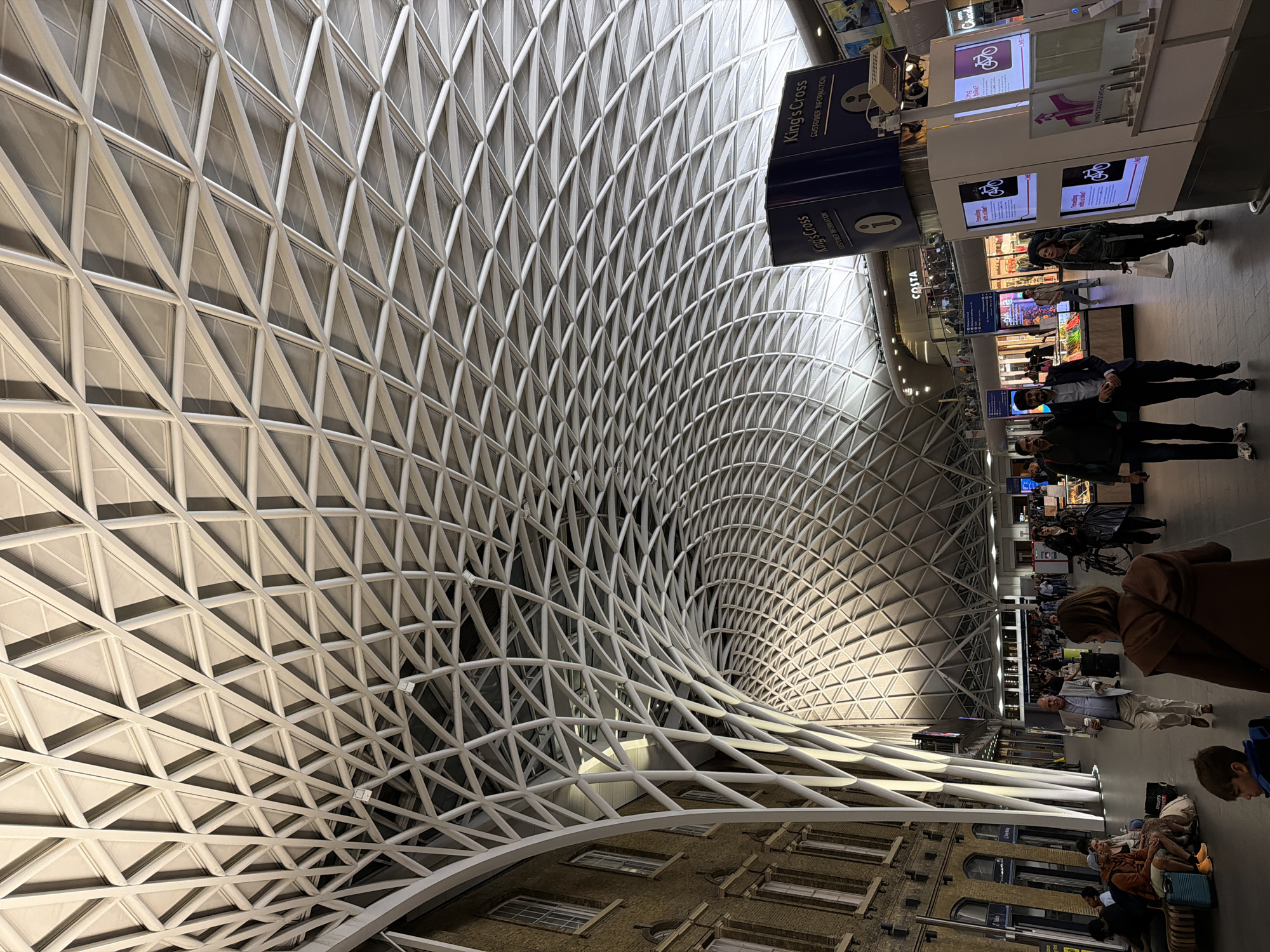 Evening architectural documentation at London's King's Cross and St. Pancras stations