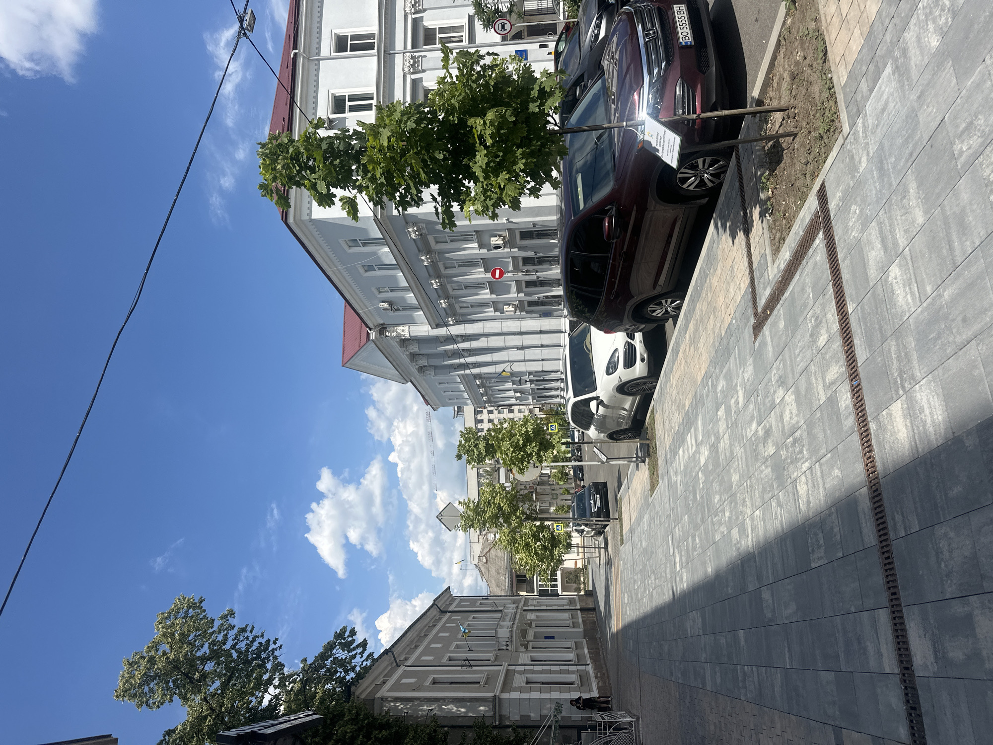 Sunny afternoon streets and greenery in Ternopil, Ukraine