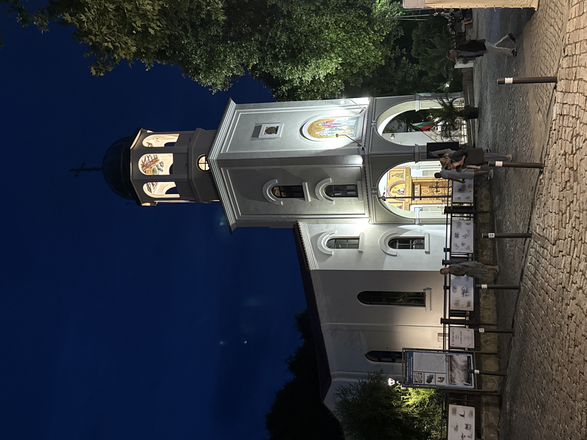 Nighttime stroll through a European town's historic streets and churches