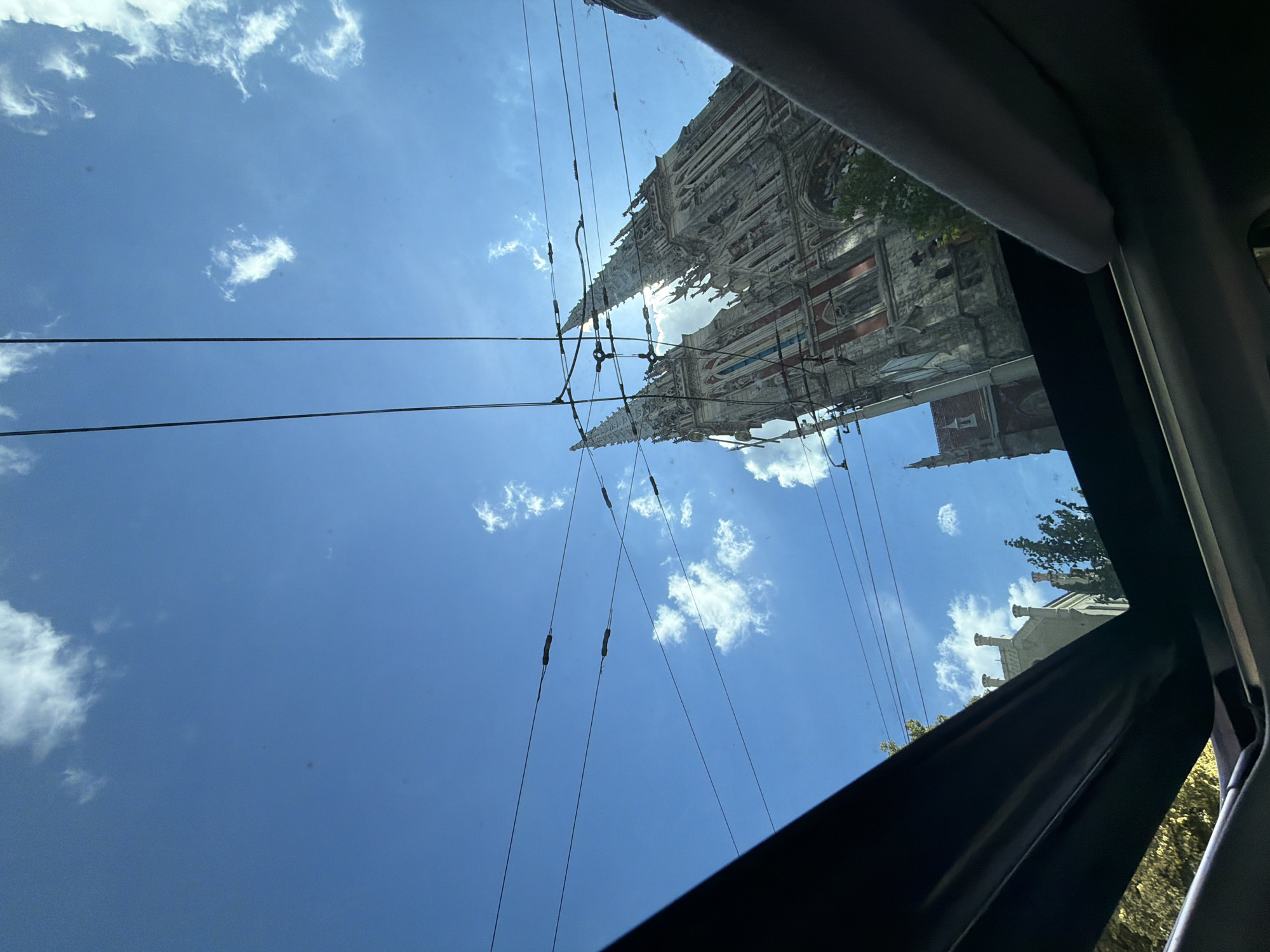 Driving through central Kyiv past the Catholic Cathedral
