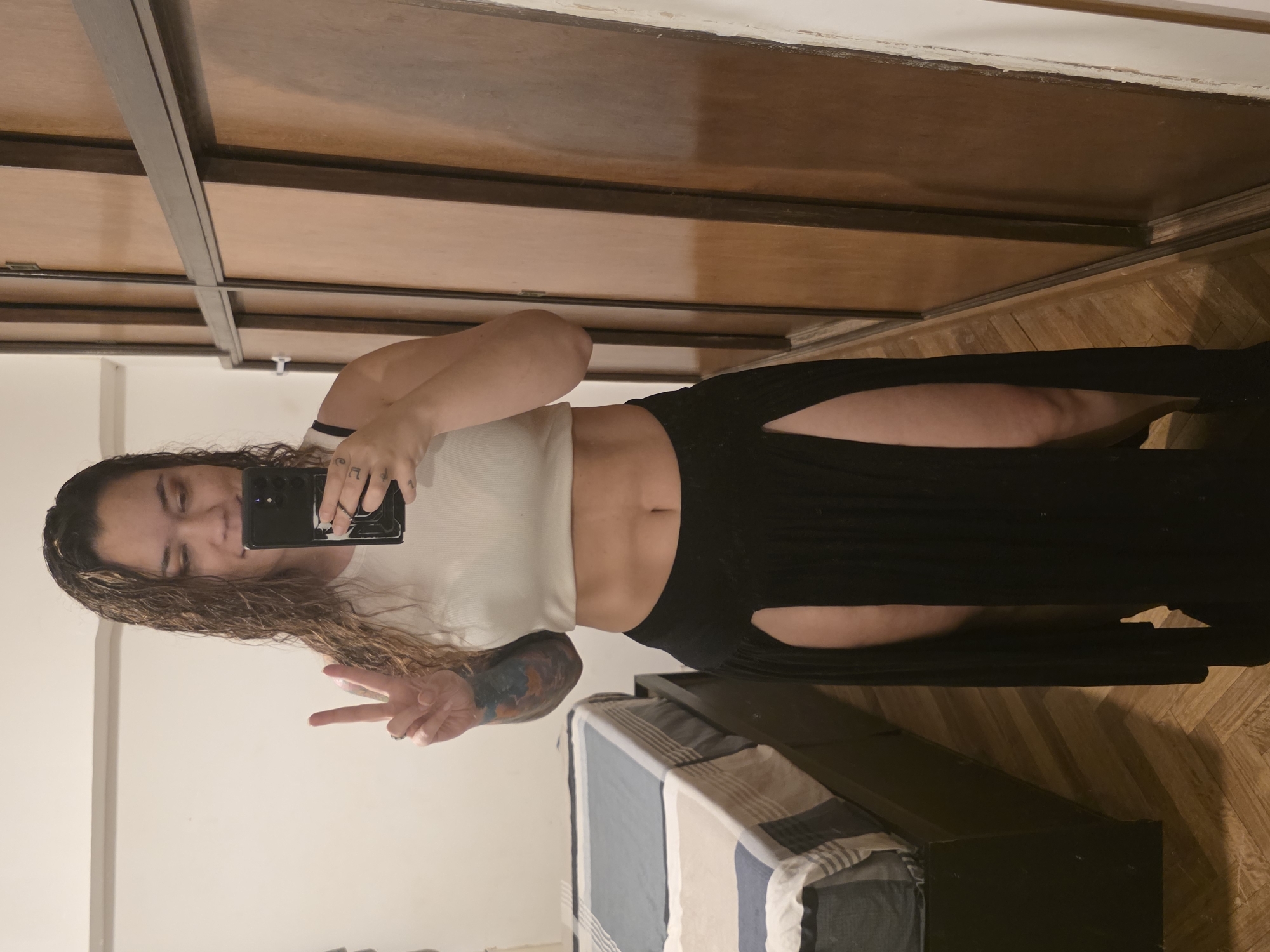 Woman takes mirror selfies at home in Buenos Aires