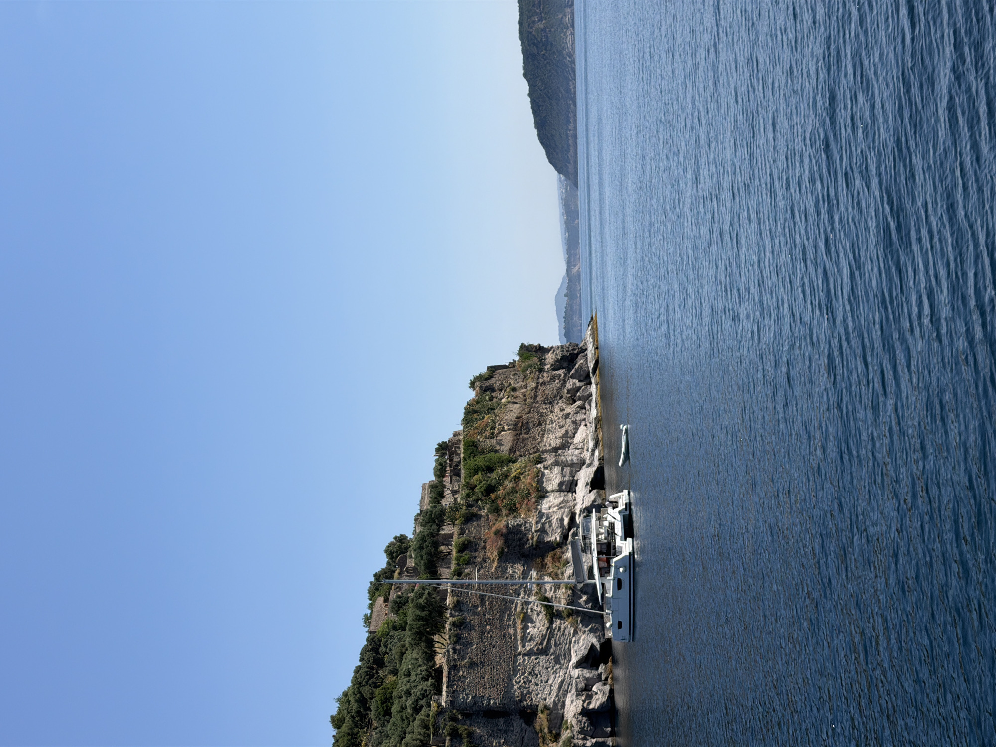 Boat tour captures scenic Ischia coastline and Aragonese Castle