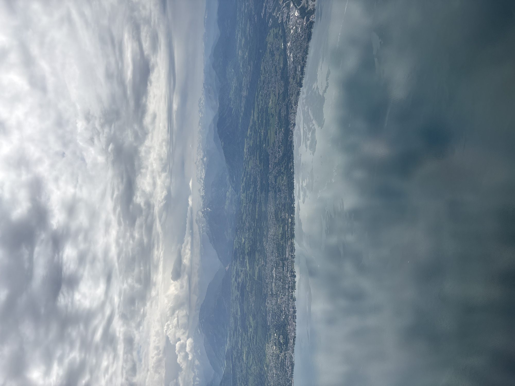 Cloudy landscape view captured over Saint-Sulpice, Switzerland
