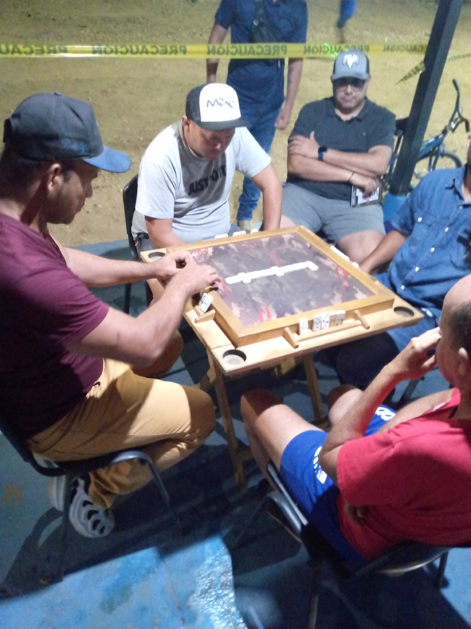 Late-night dominoes game draws six men in Juan Griego