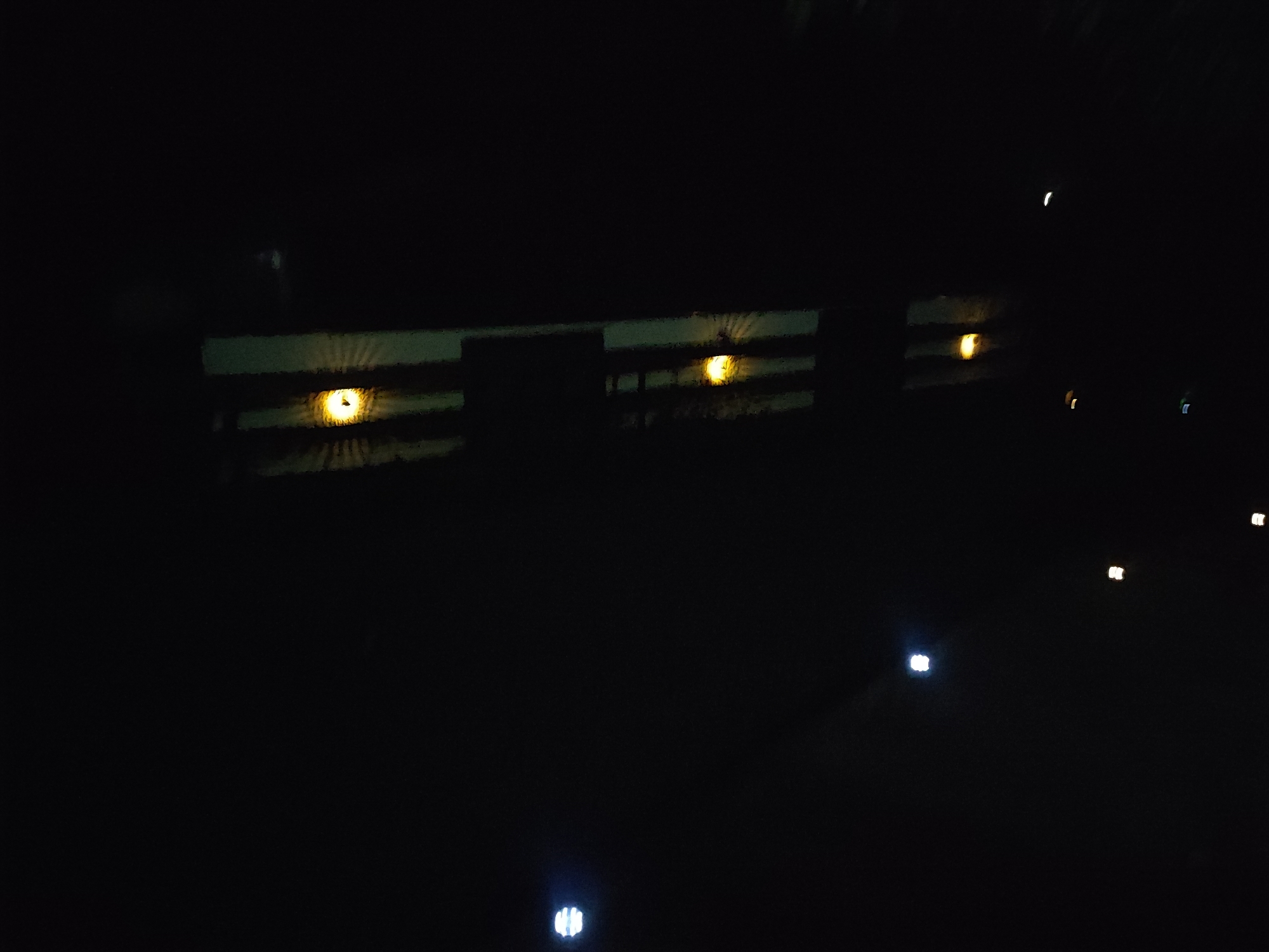 Ornate lantern light patterns at a nighttime spot in Târgu Neamț
