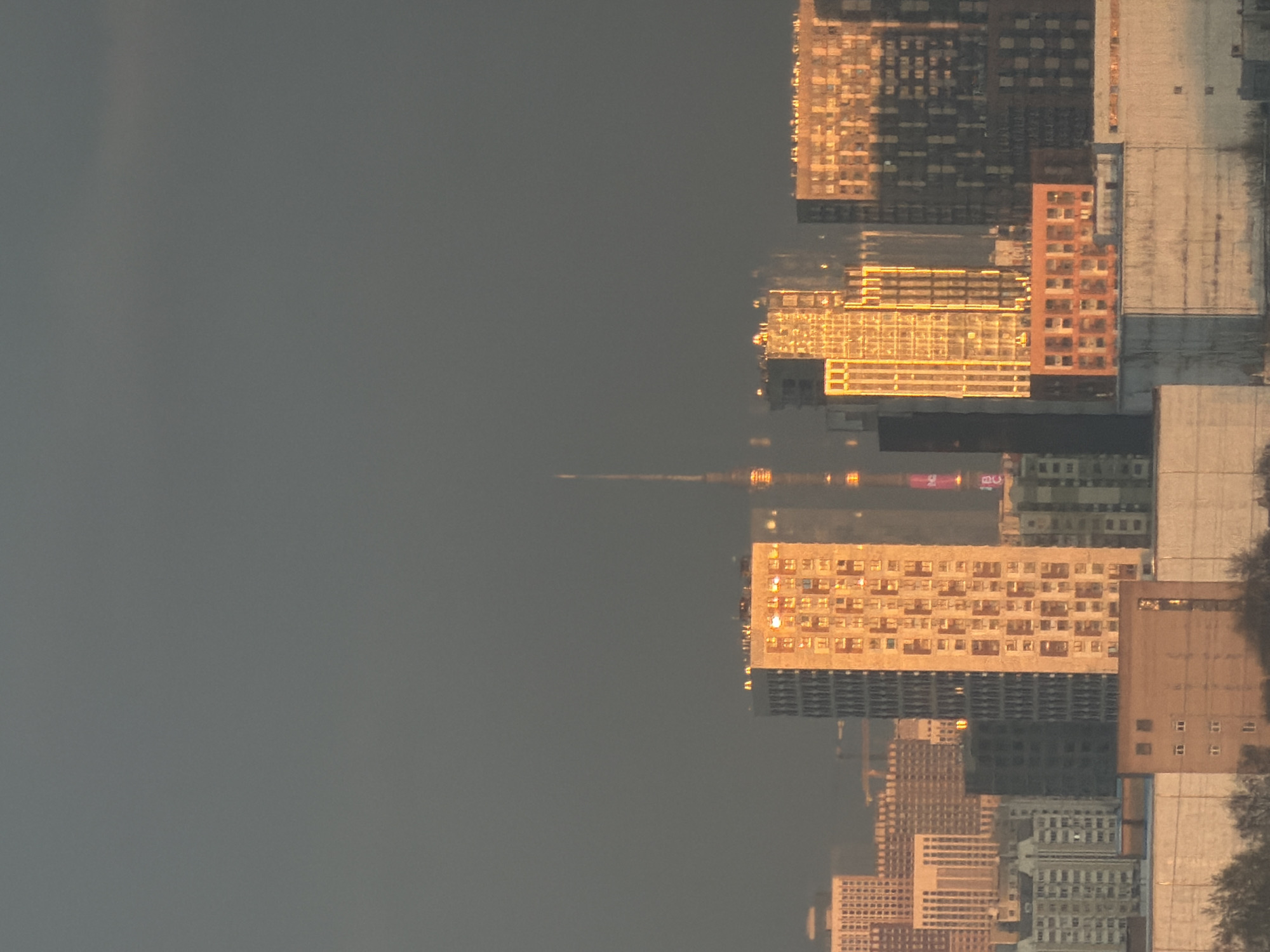 Khimki cityscape captured in water reflections during evening hours