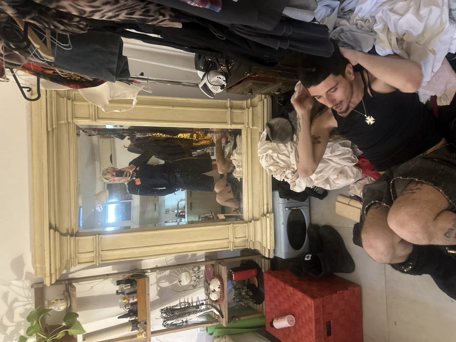 Interior scene captured in Tel-Aviv living space features ornate mirror