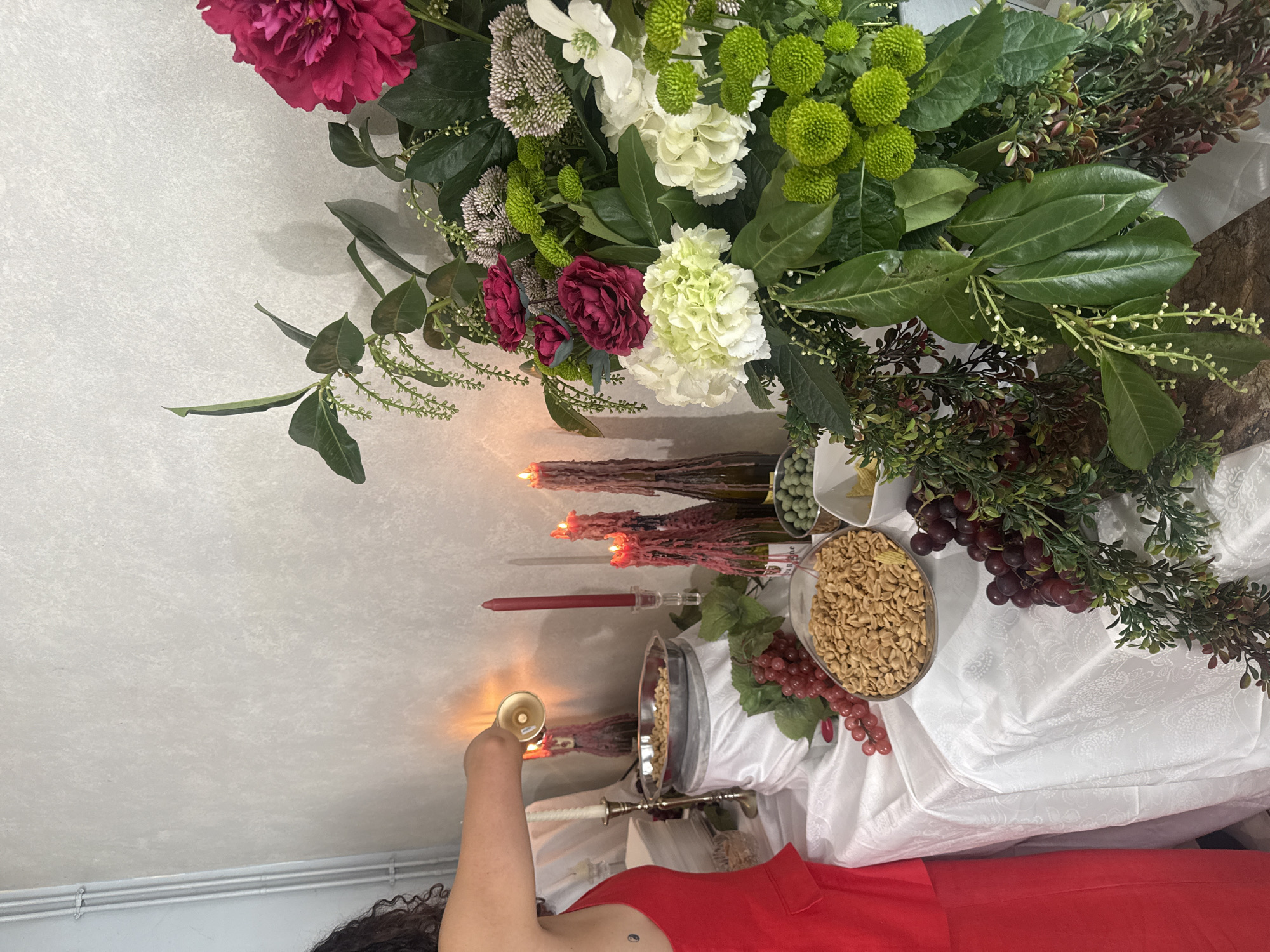 Woman hosts dessert celebration with cakes in Wattrelos