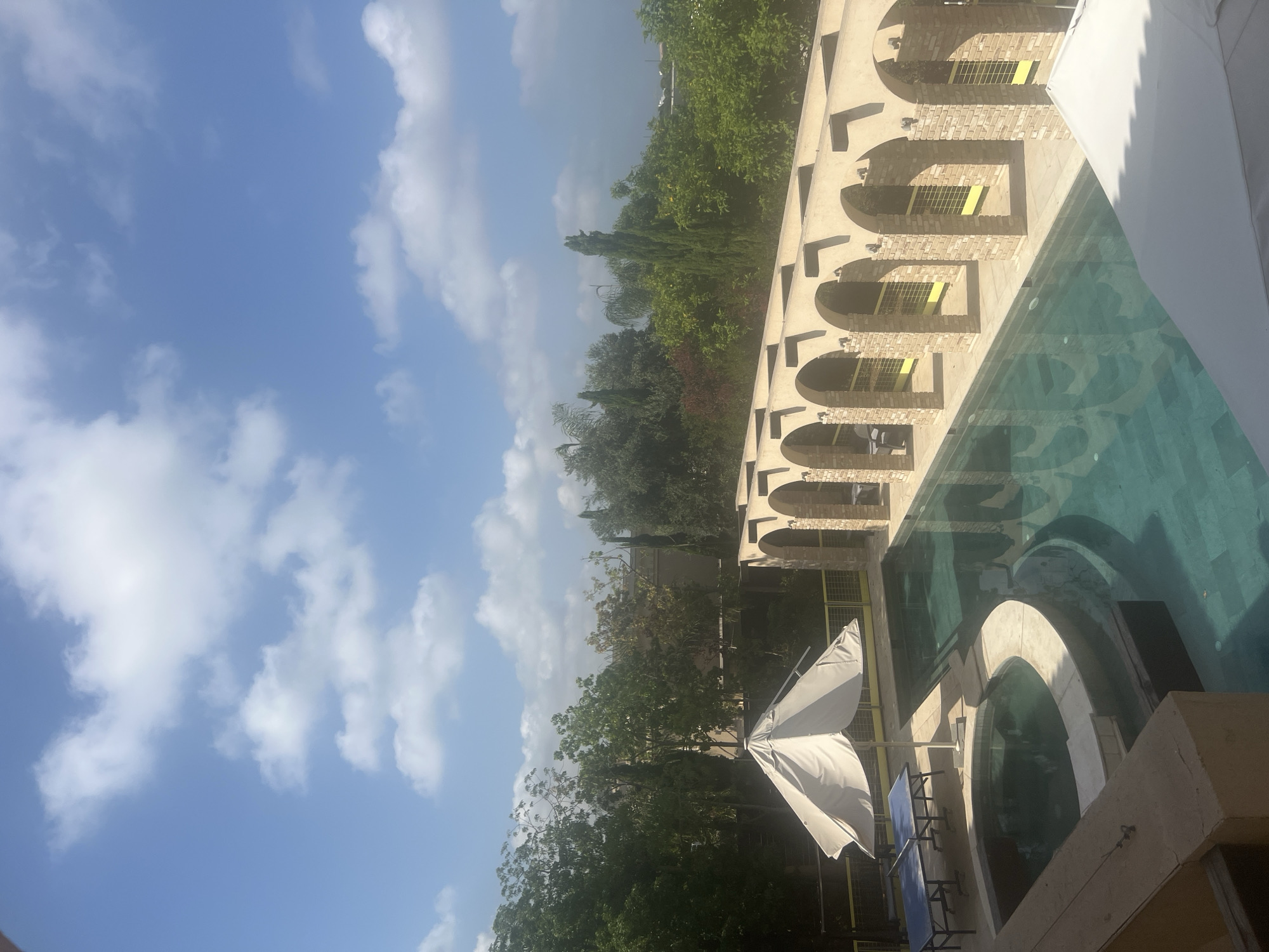 Poolside and street views from a coastal Israeli property