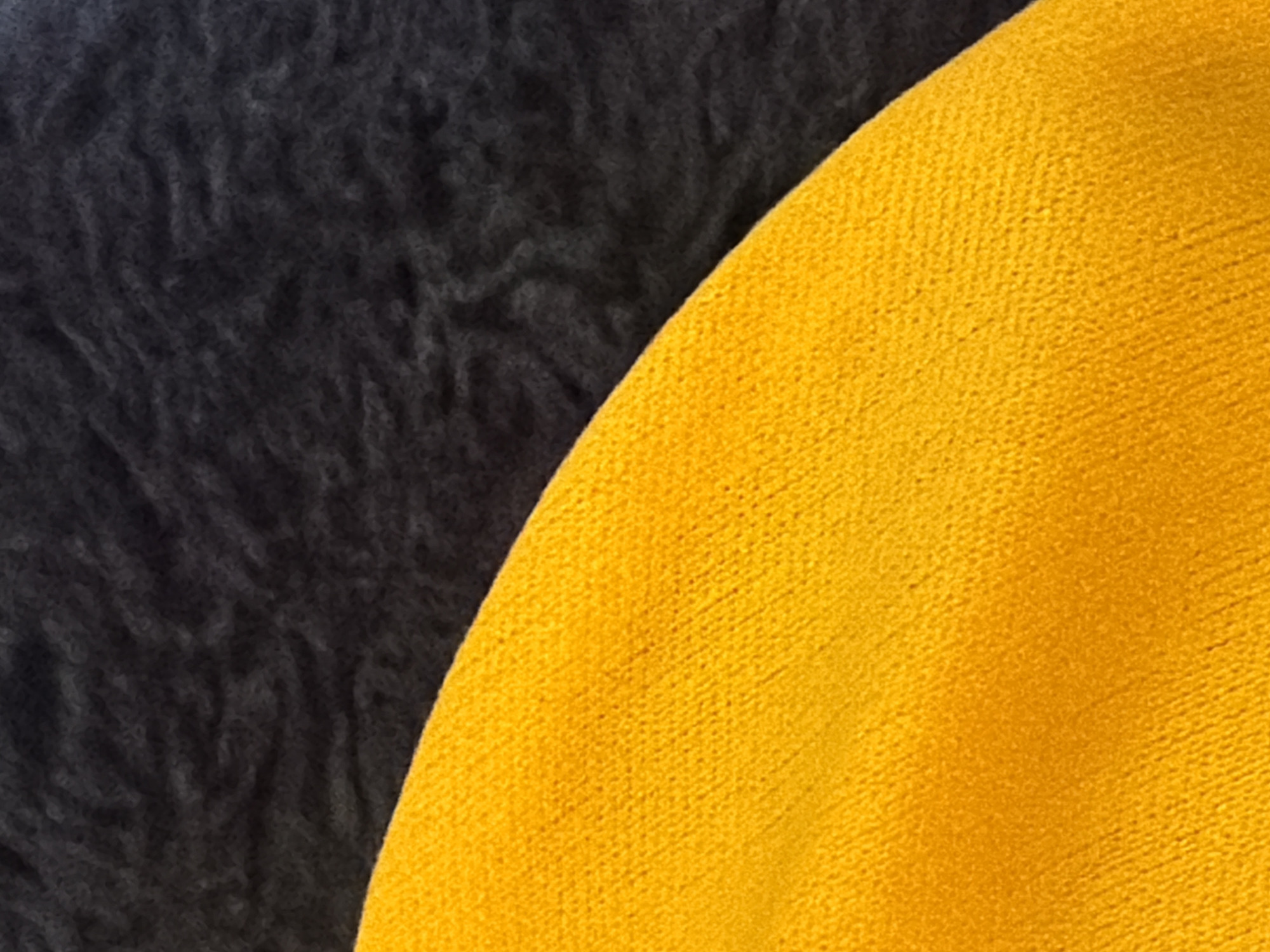 Scattered close-ups of fabrics, a phone, and digital art in Rome