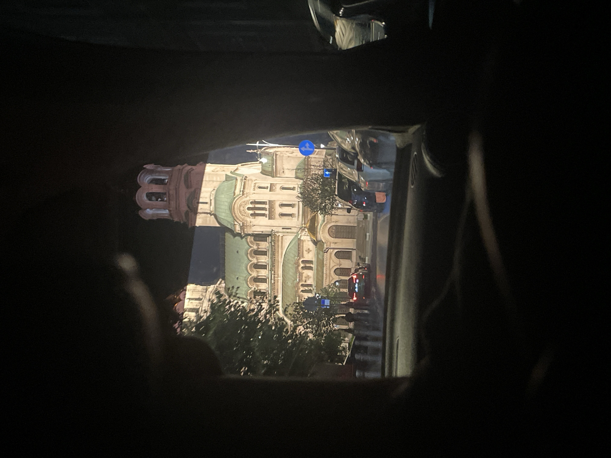 Nighttime drive past illuminated St. Alexander Nevsky Cathedral, Sofia