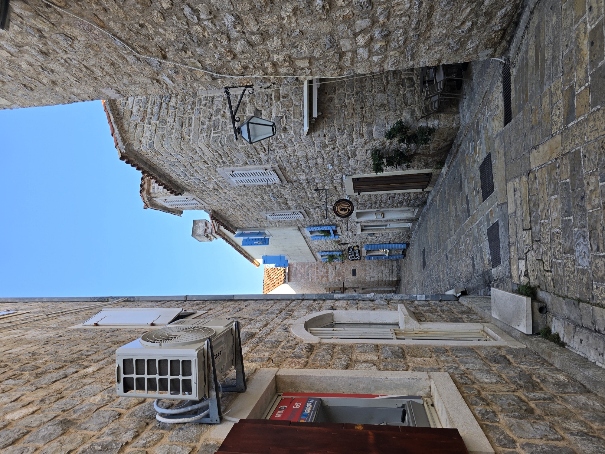 Budva's Old Town alleys and yacht-lined marina on a summer morning