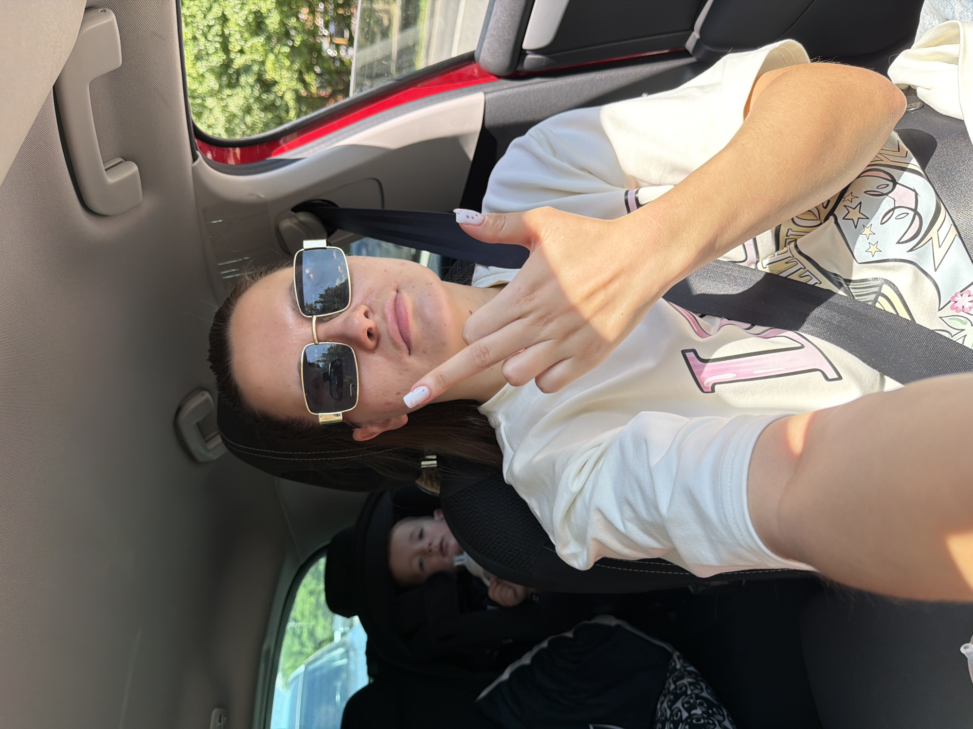 Woman Takes Selfies in Car in Odintsovo
