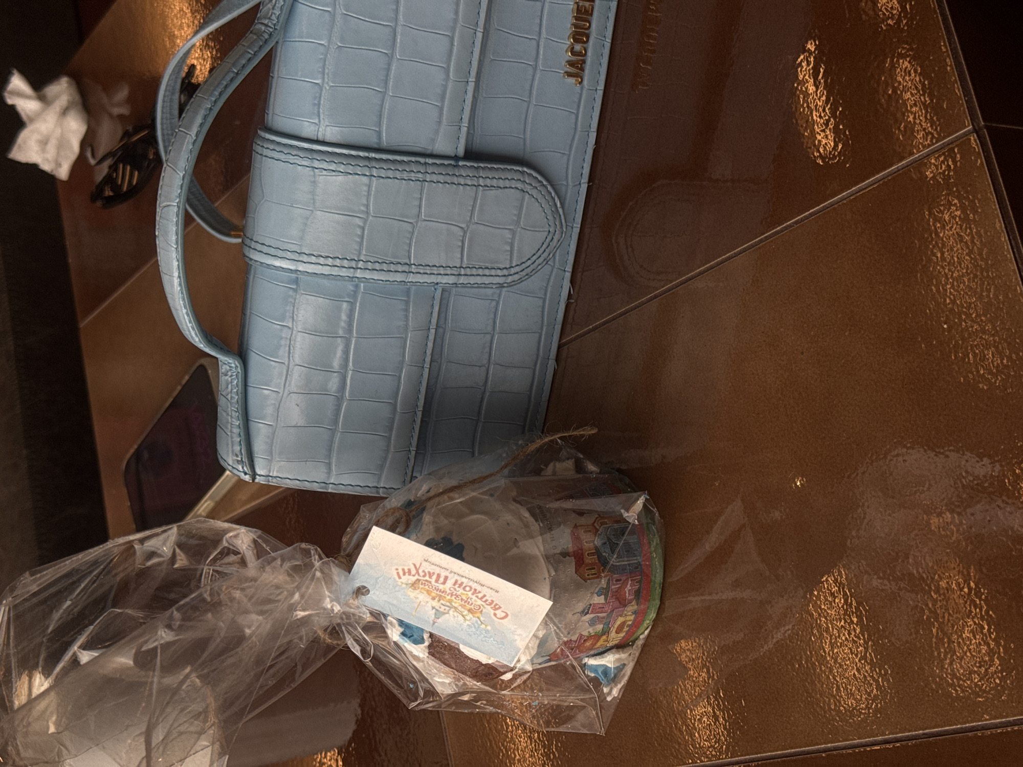 Designer handbag and packaged plate spotted in Khimki