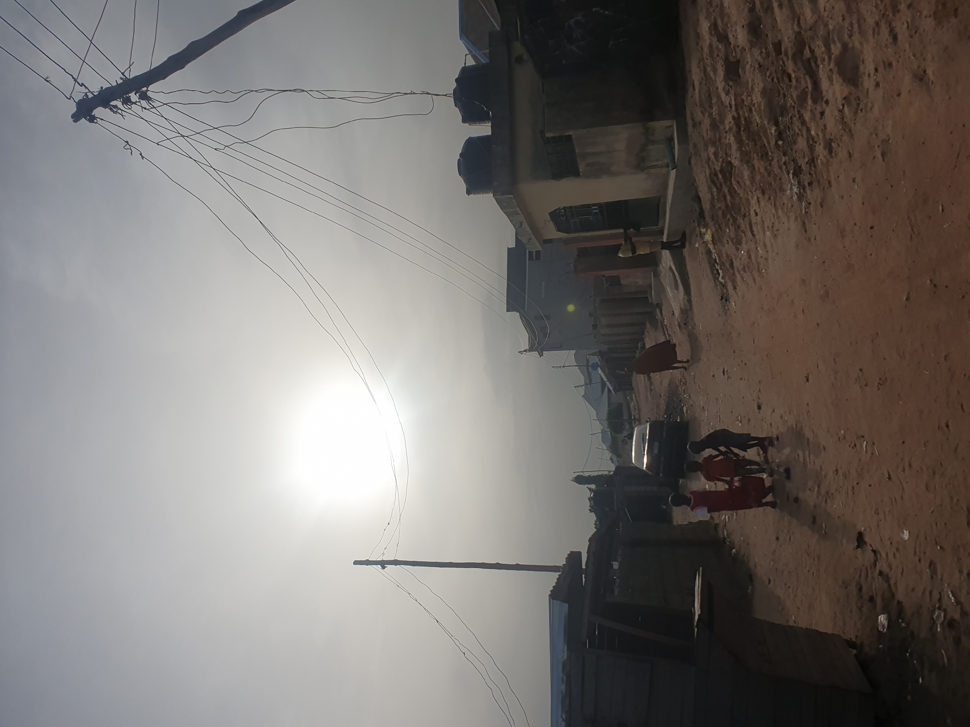 Women and children gather in residential courtyard, Lokoja Nigeria